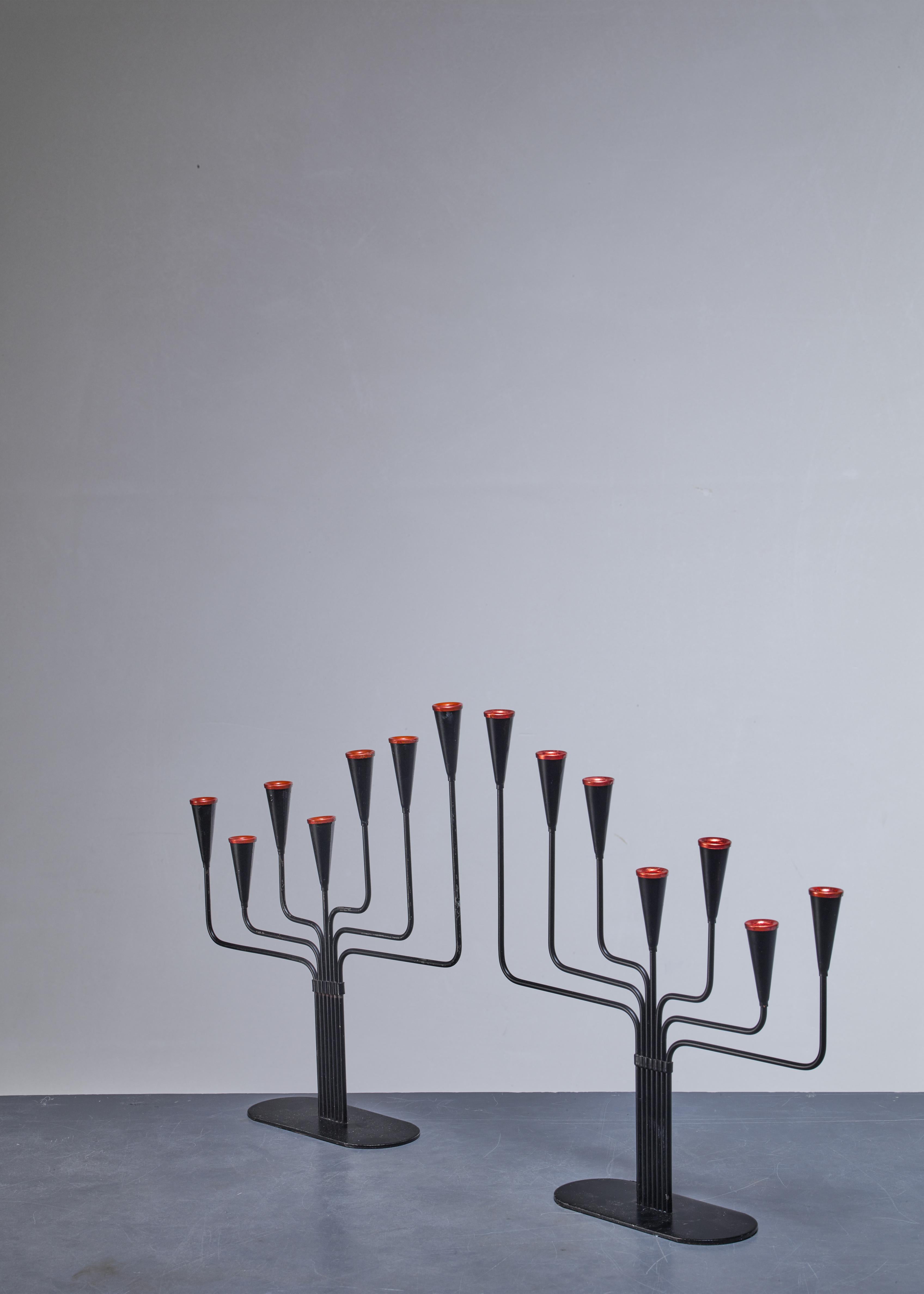 A pair of candelabra for seven candles each, designed by Gunnar Ander for Ystad, Sweden.
They are made of black lacquered metal with copper details.

The set as per the last picture is also available.