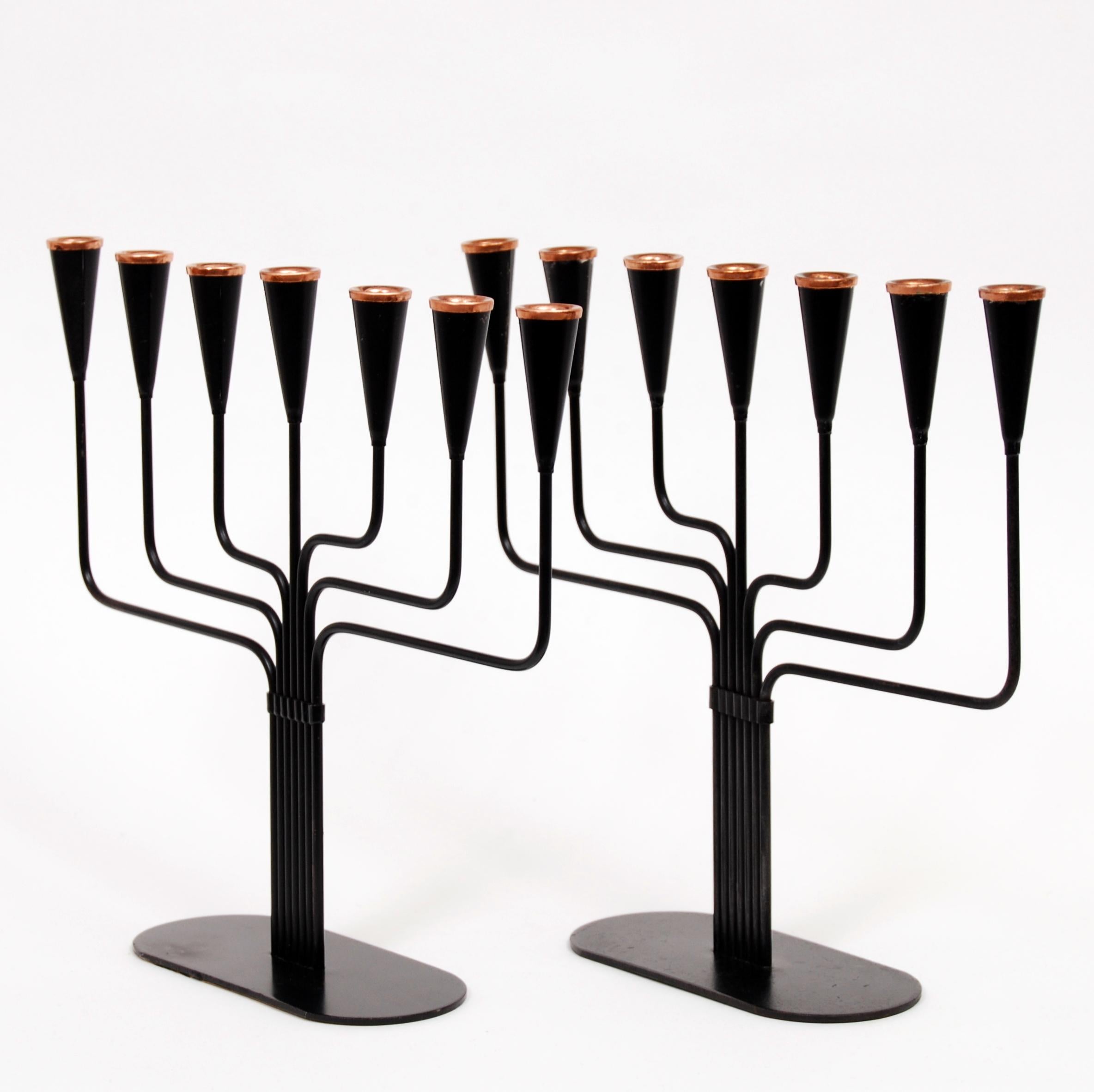 A pair of Gunnar Ander candelabras in metal with bronze tops. Manufactured by Ystad Metall. 1970s.
    