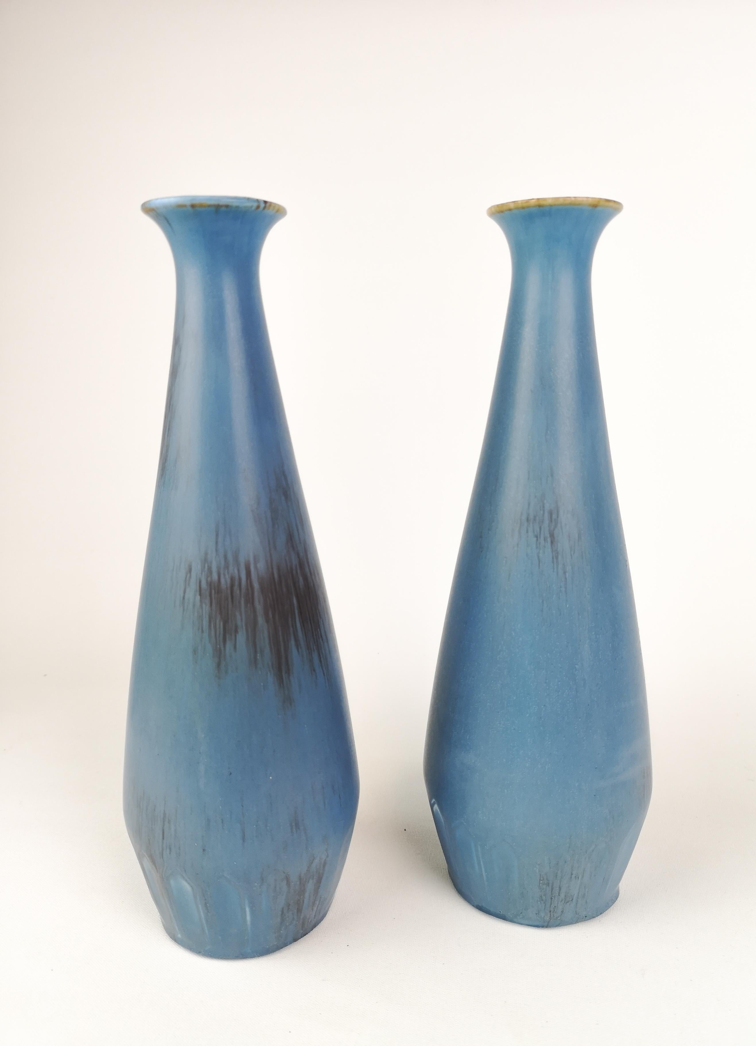 Two rare vases produced by Rörstrand and designed by Gunnar Nylund Sweden in the early 1950s. 
Wonderful sculptured vase with a nicely done glaze.

They are in good condition.

Measures: H 29 cm, D 10 cm.