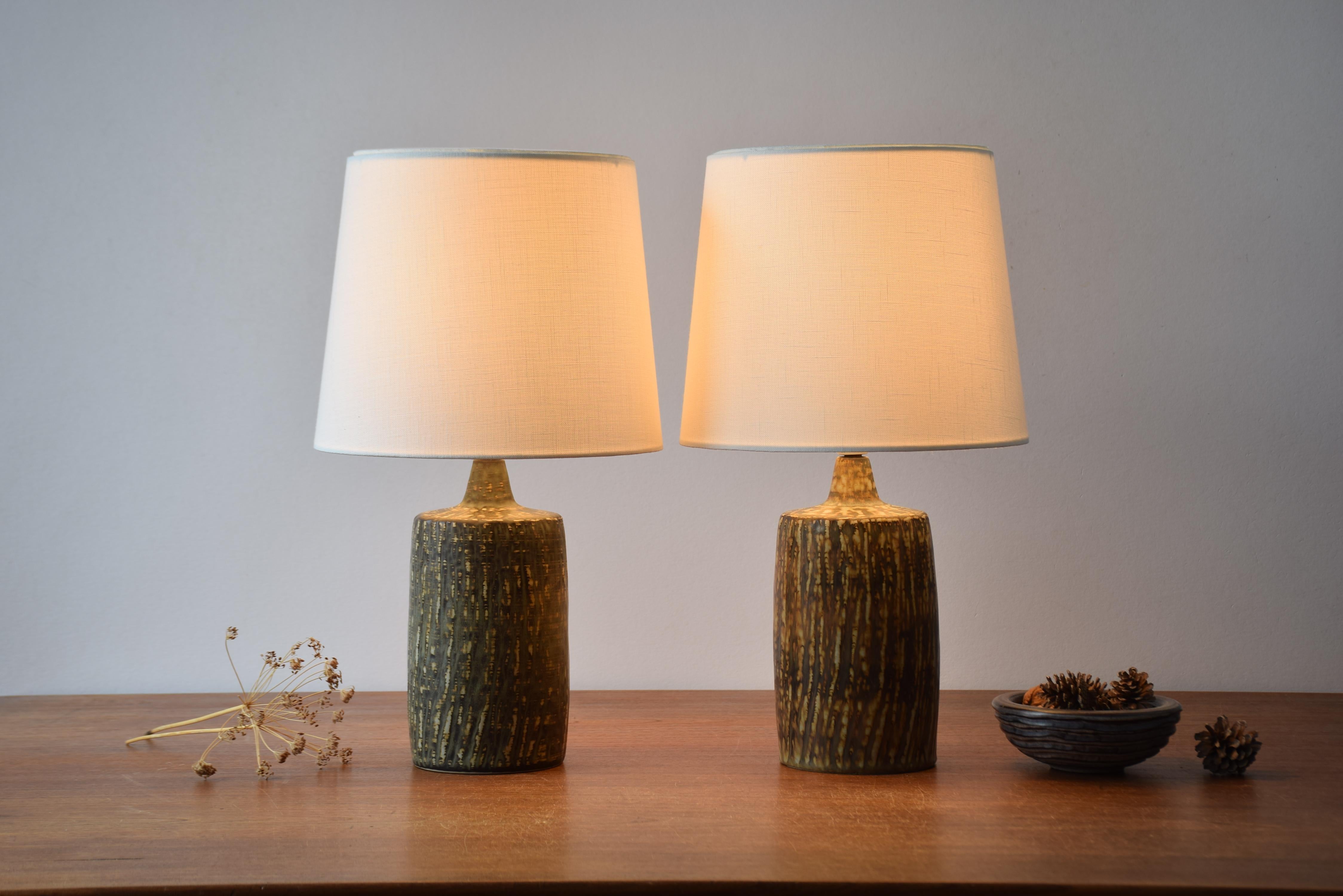 Pair of vintage ceramic table lamps by Gunnar Nylund for Rörstrand, Sweden.
They are part of the 