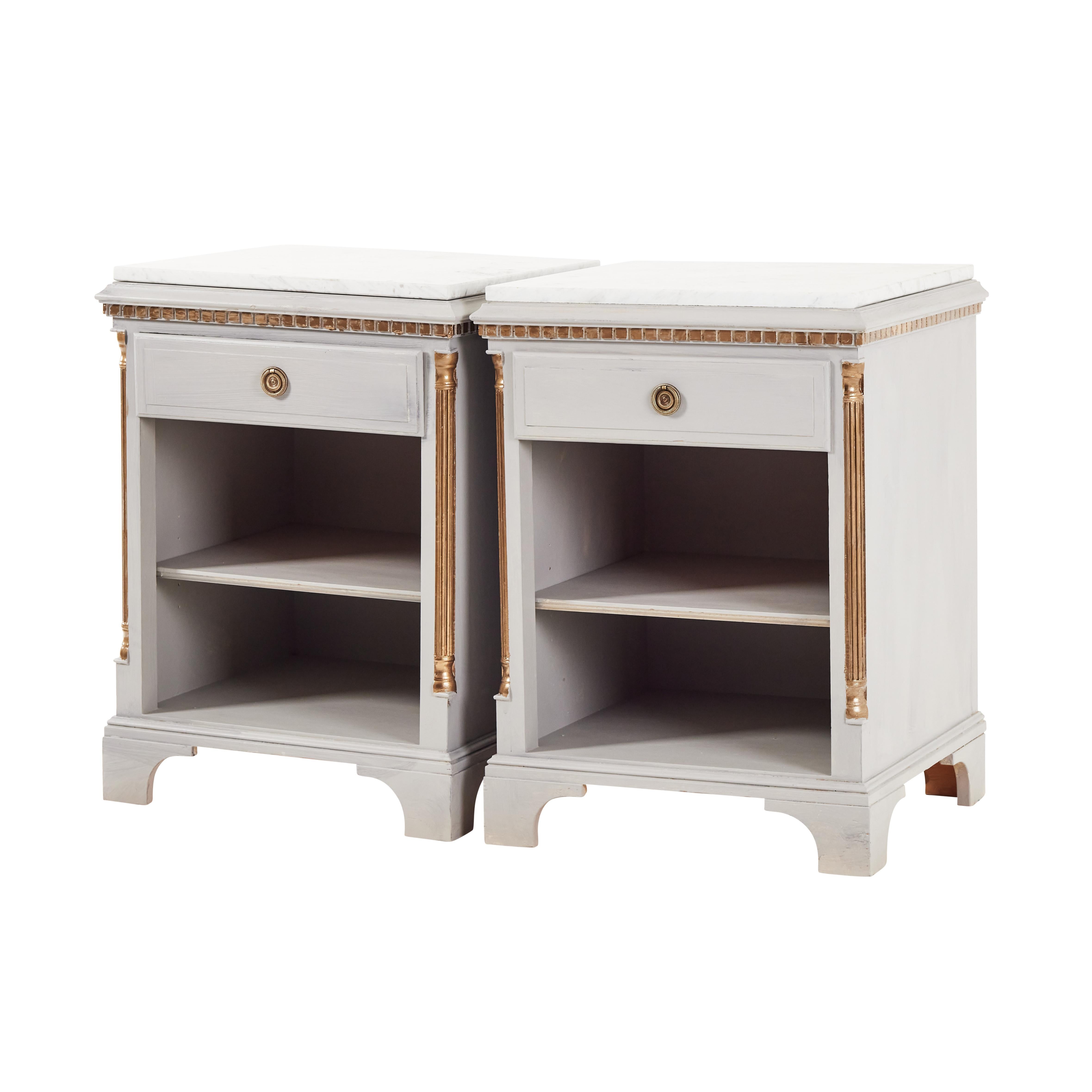 Gustavian style bedside tables with white marble top. Made in second half of 20th century. Greay color with gold detailing.

Width: 50cm / 19.7