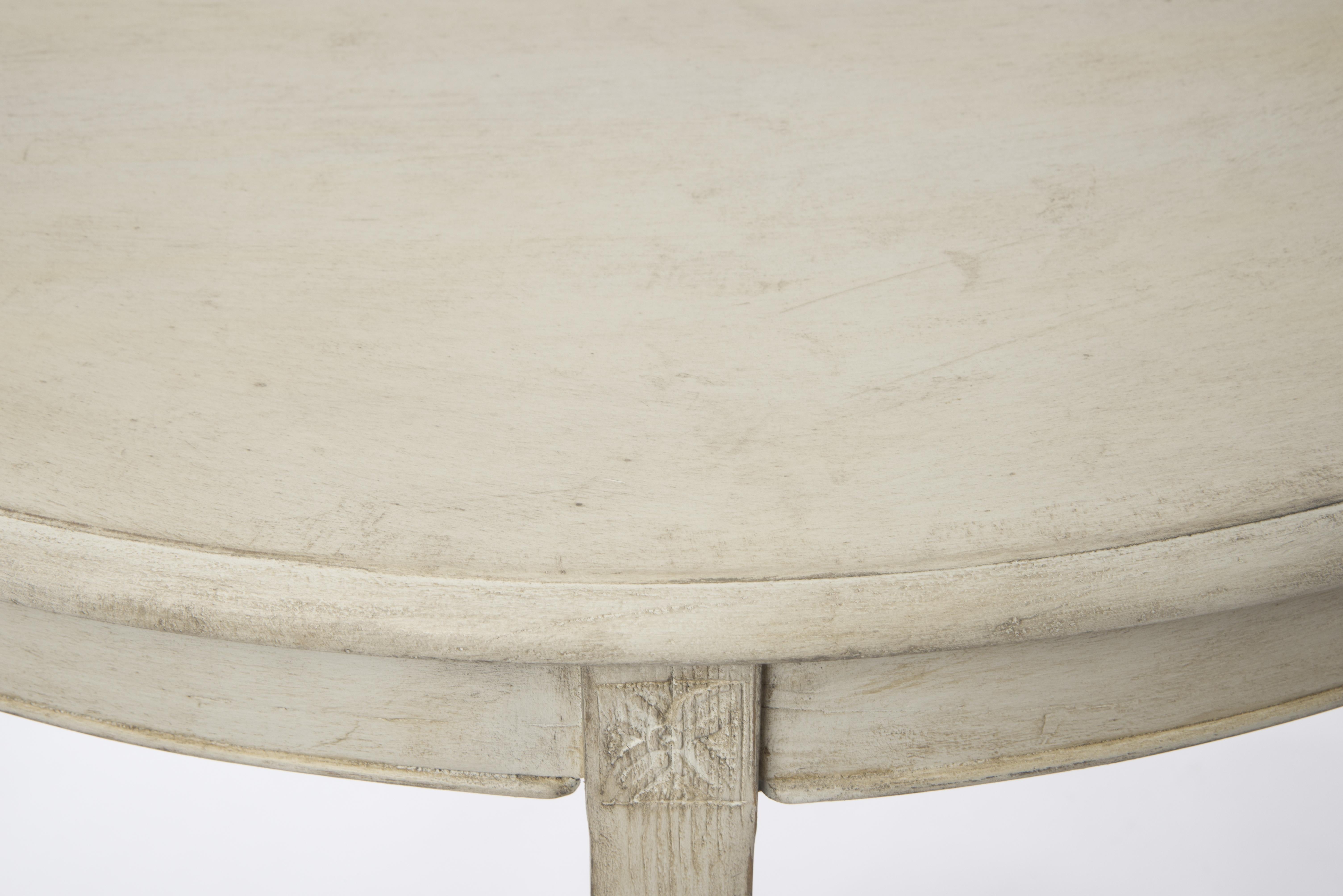 This very clean and subtle pair of Gustavian demilune tables can be integrated seamlessly in most interiors and are great for the entrance or dining room. The paint of the tables has been professionally retouched. Place of origin: Sweden. Period: