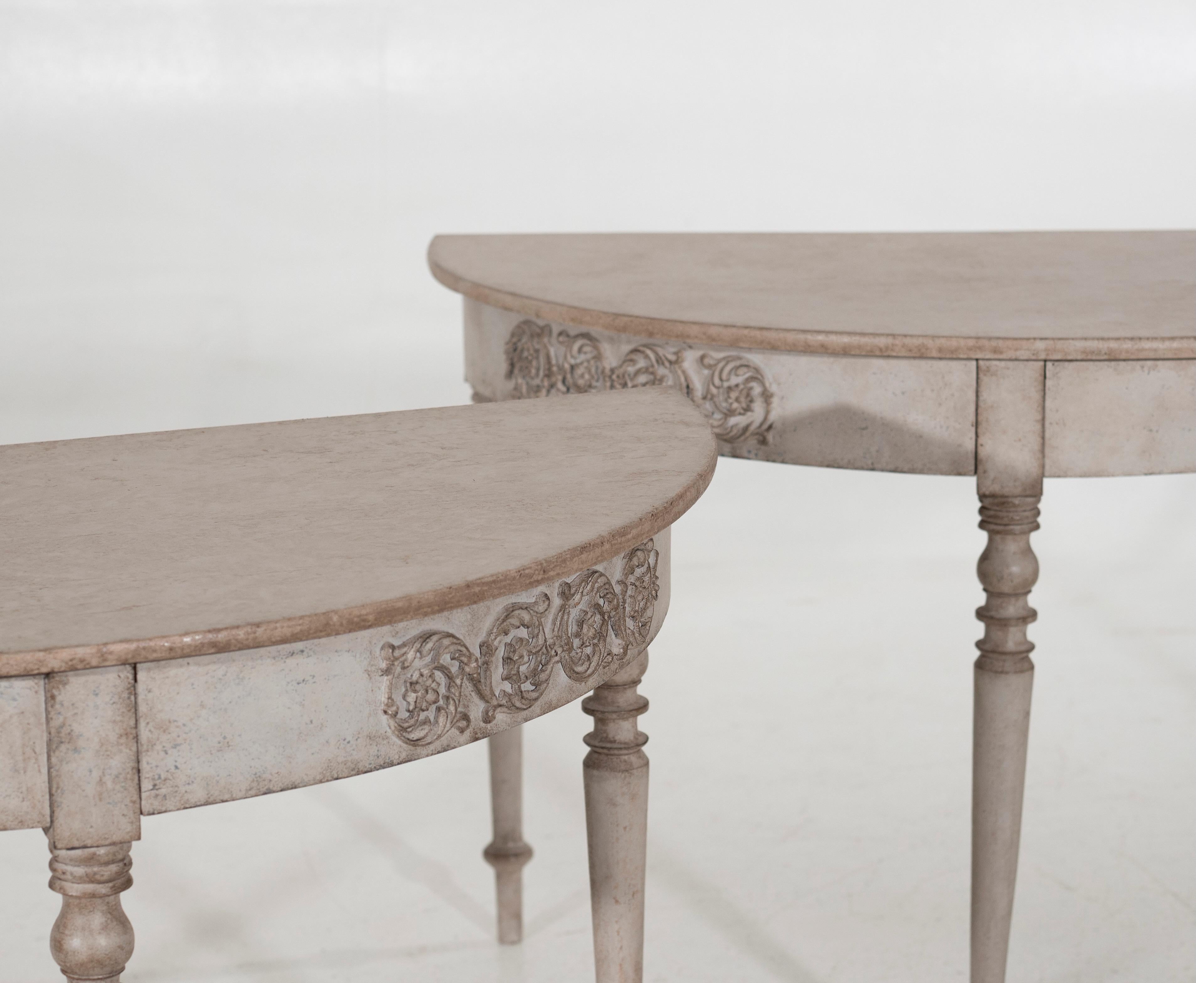 Stunning pair of Gustavian half-moon tables with fine decorations, 19th Century.