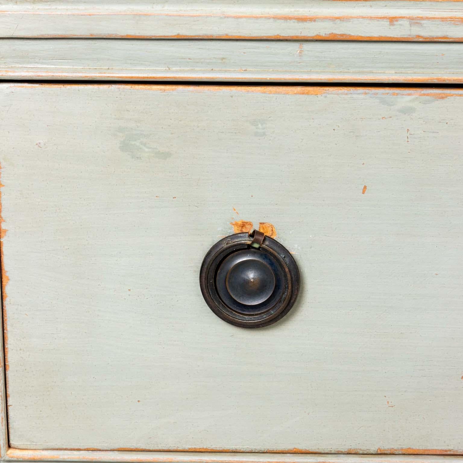 Pair of Swedish Gustavian style green grey chest of drawers with silver pull handles.
