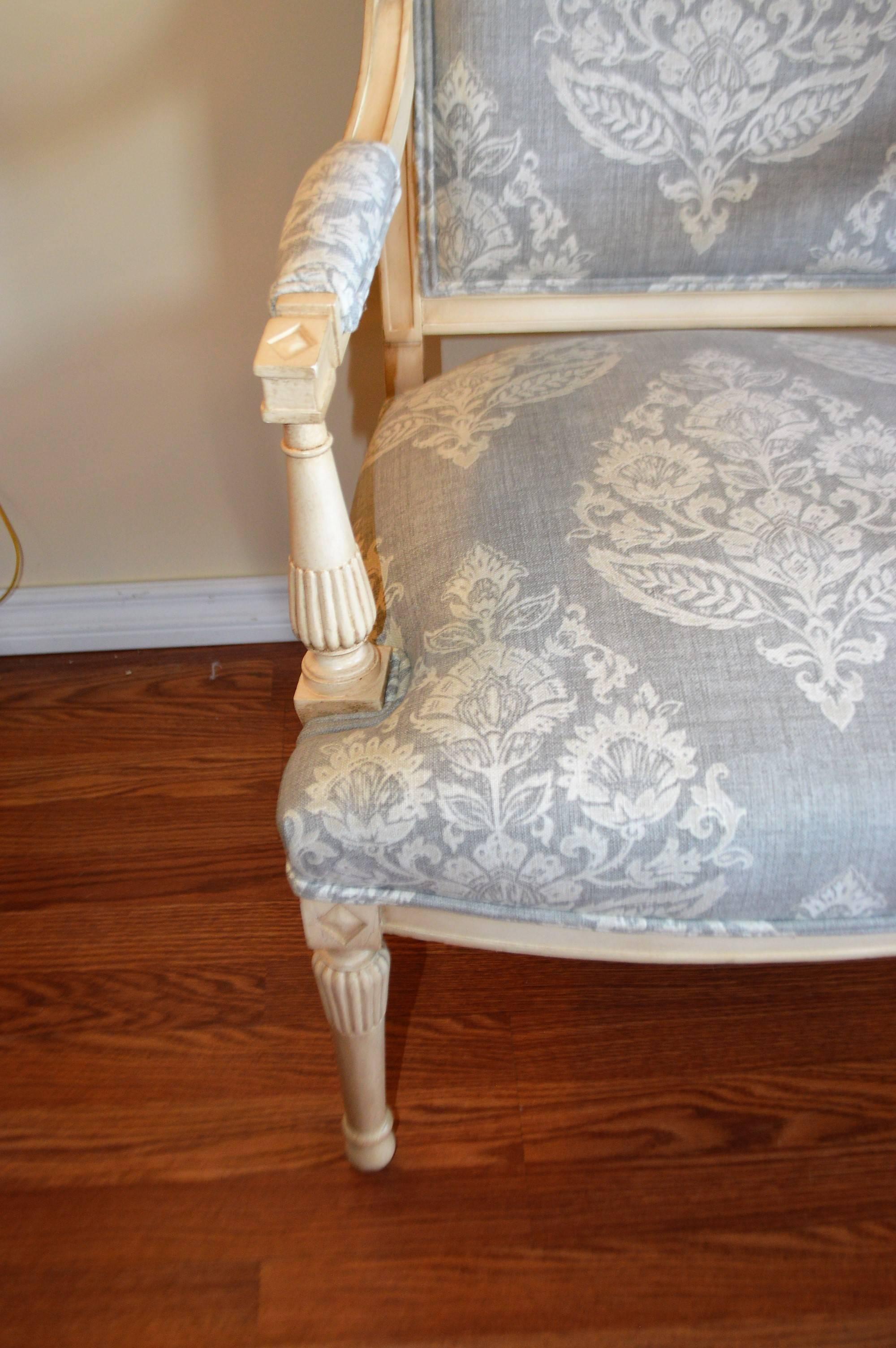 Pair of Gustavian style armchairs from France, circa 1920 painted in light cream and newly upholstered in damask pattern linen in light grey and off-white.
Very chic, will enhance any room.