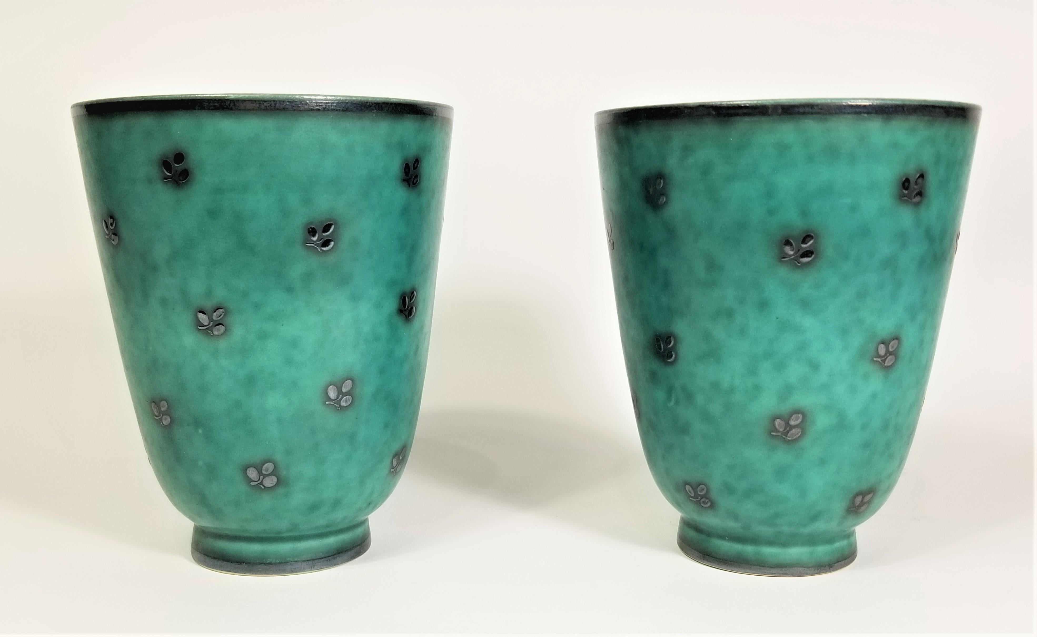 Pair of Art Deco 1930s Gustavsberg Argenta Sweden by Wilhelm Kage Vase or Vessel. Ceramic with Sterling Silver Overlay. All Markings on bottom. Excellent Condition. 

