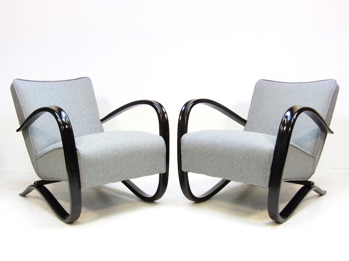 Two original 1930s H-269 armchairs by Jindrich Halabala.

Newly re-lacquered and reupholstered in soft but very resilient Italian wool, they are Fine examples of Art Deco design. 

Amongst the most celebrated Czech furniture designers of the