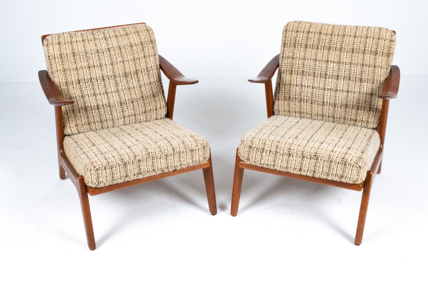 One of the more iconic designs of Danish mid-20th century furniture designer H. Brockmann-Petersen, these attractive lounge chairs feature sculptural frames in well-crafted teak wood. Recognizable for their strong yet elegant angular forms, these