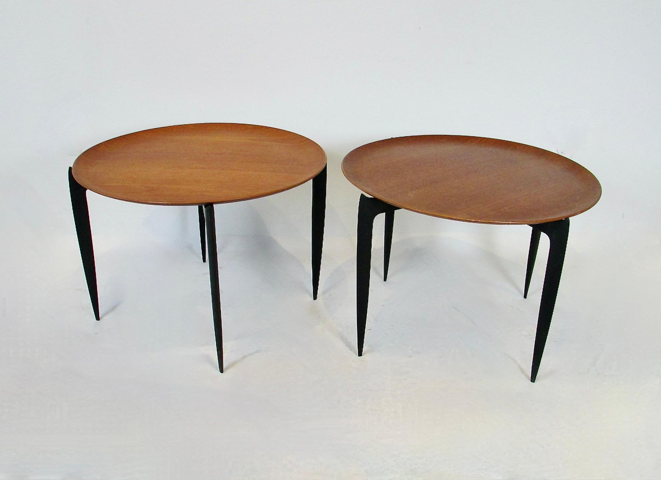 Pair of Danish teak tray tables (Model 4508) designed  by Svend Åge Willumsen and Hans Engholm for Fritz Hansen in 1958 . Great representation of form and function,  both practical and nicely crafted while maintaining elegance in its minimalism