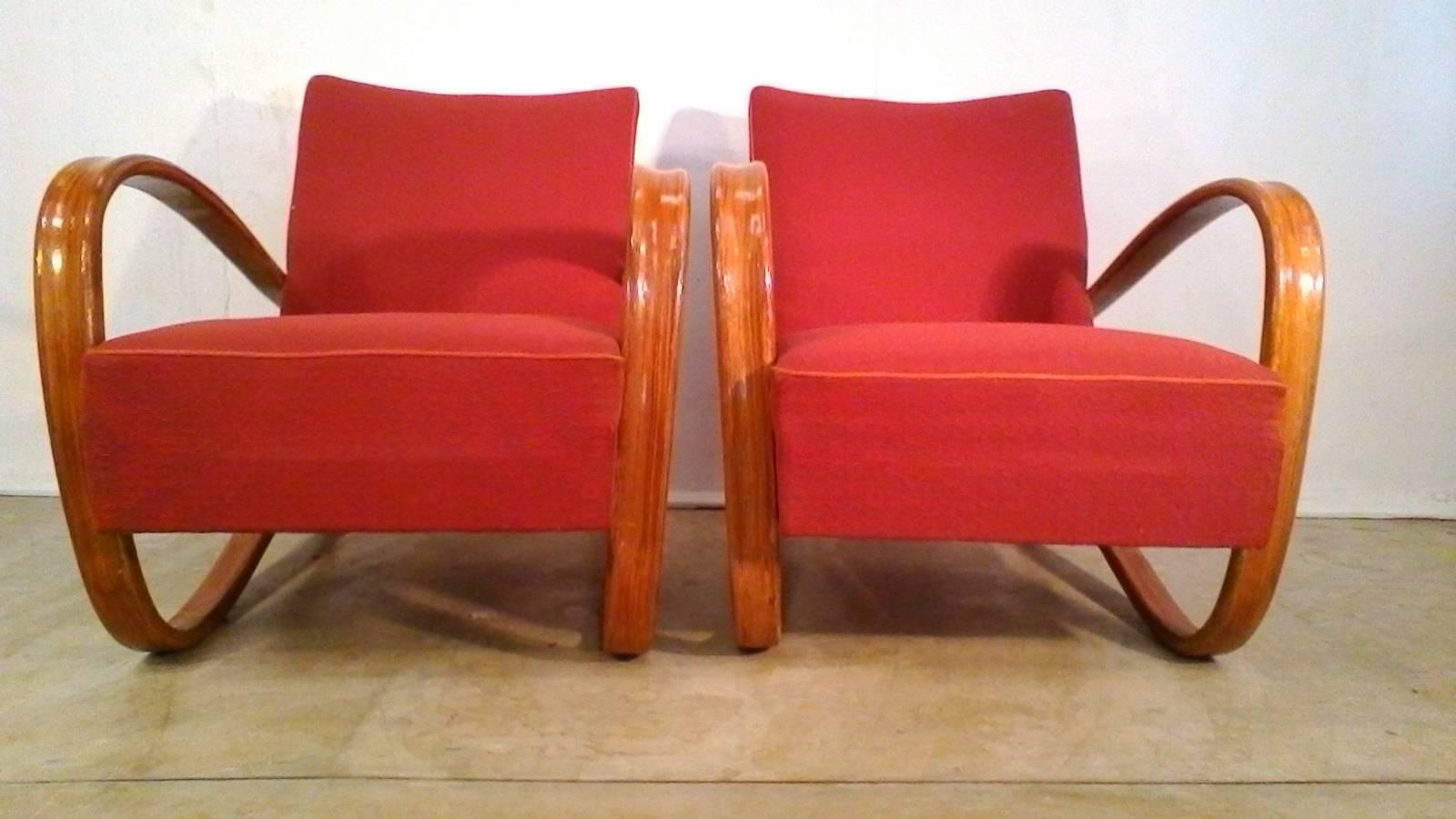 Iconic H-269 chairs by Jjindrich Halabala in very good, original condition. They show only minor wear on the wooden parts and original upholstery. Not restored.