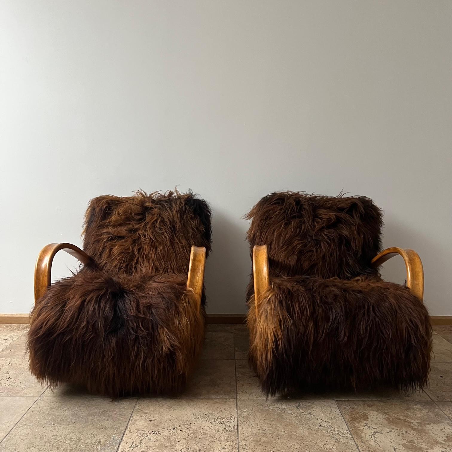 A pair of armchairs by Jindrich Halabala. 

Czechoslovakia, 1930s. 

The much sought after iconic H-269 Model.

Professionally upholstered in sheepskin. A darker colour chosen for more longevity. 

Price is for the pair. 

Location: