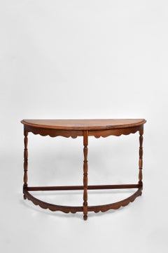 Paire de consoles en bois en forme de demi-lune, années 1950.