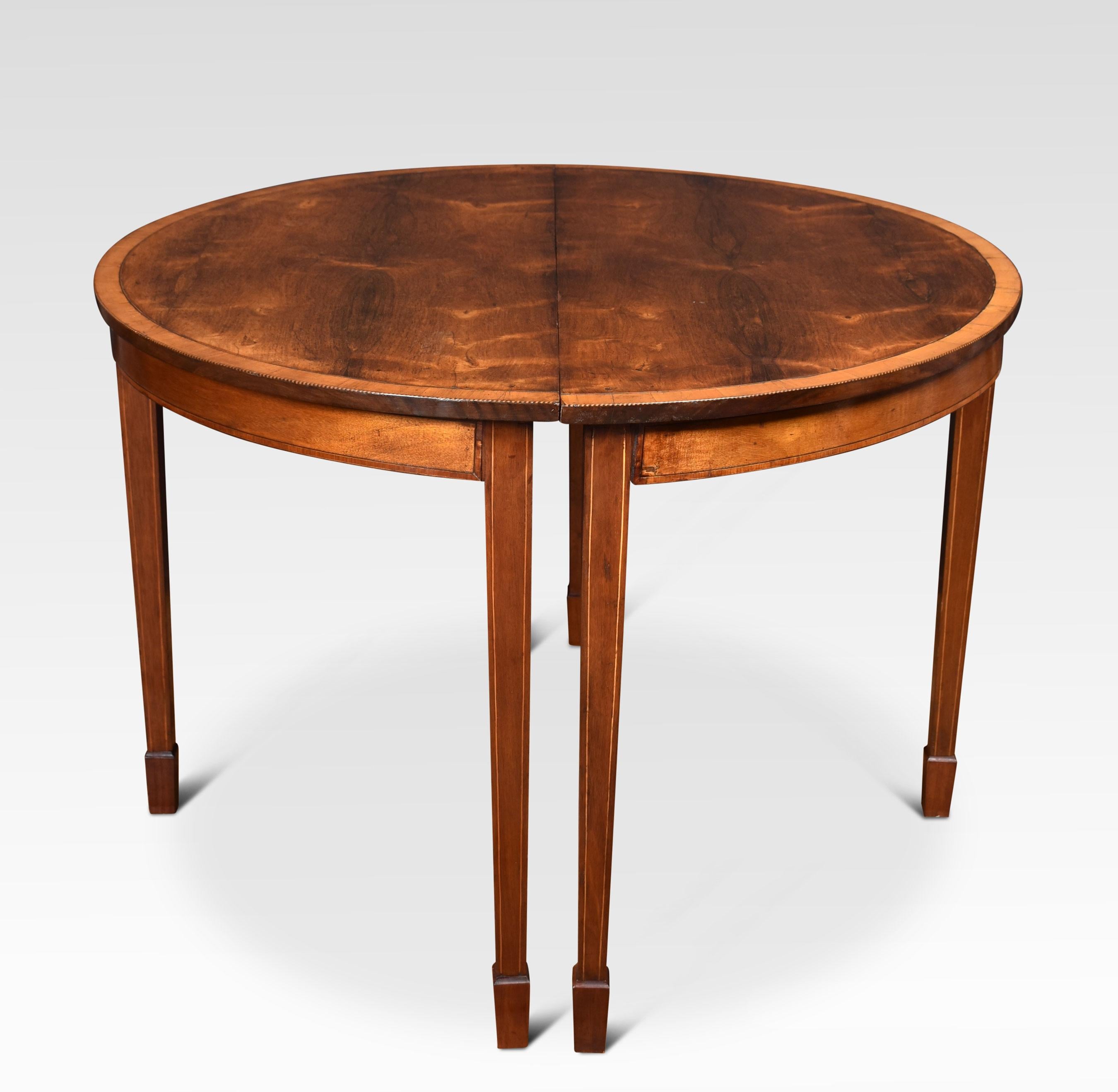 Pair of hall tables the well-figured half-round tops above satinwood banded molded edge. All raised up on tapering legs terminating in spade feet.
Dimensions
Height 32.5 inches
Width 48.5 inches
Depth 25 inches.