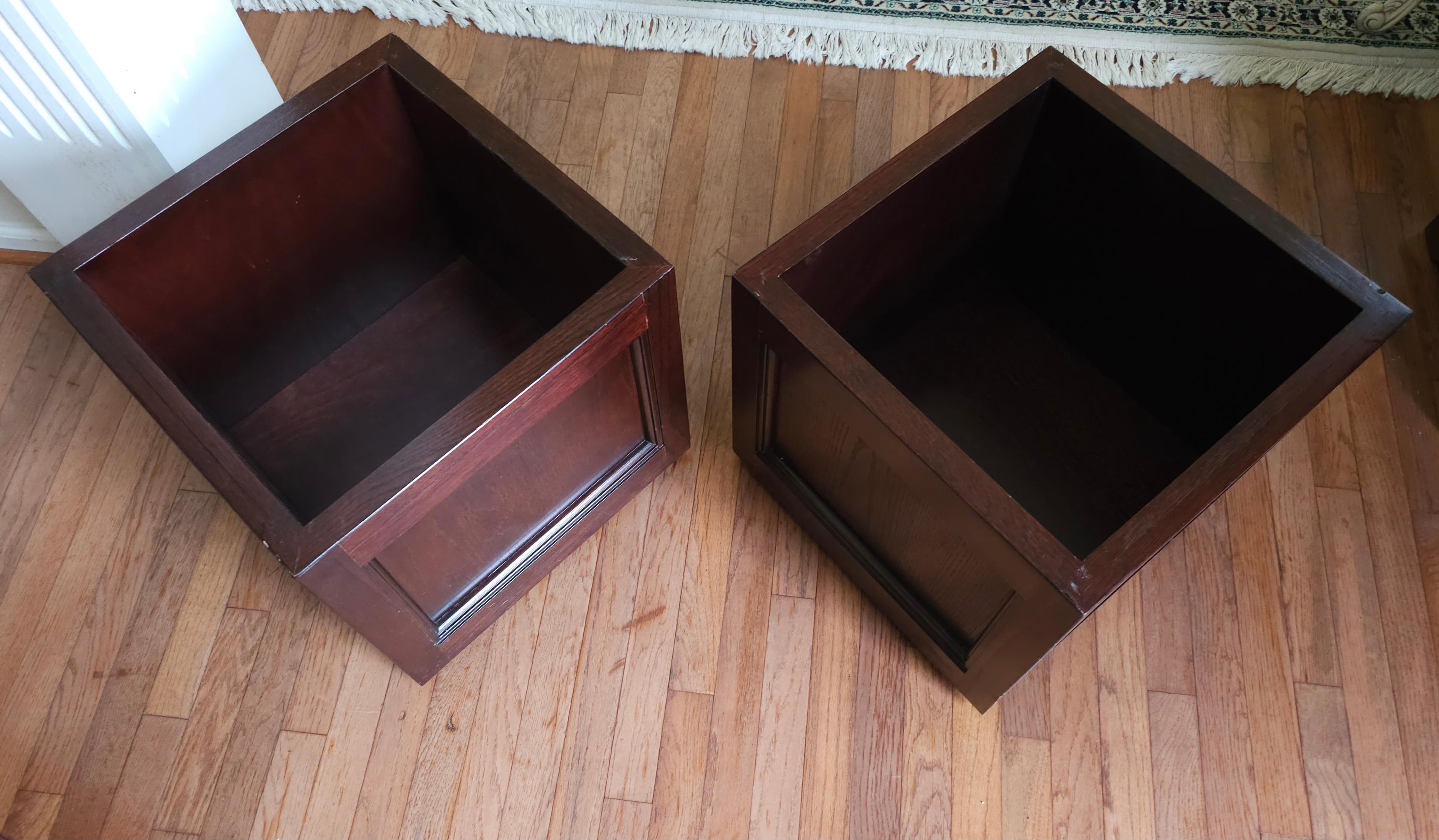 Modern Pair Of Hammary Furniture Fruitwood And Brown Leather Rolling Storage Ottomans For Sale