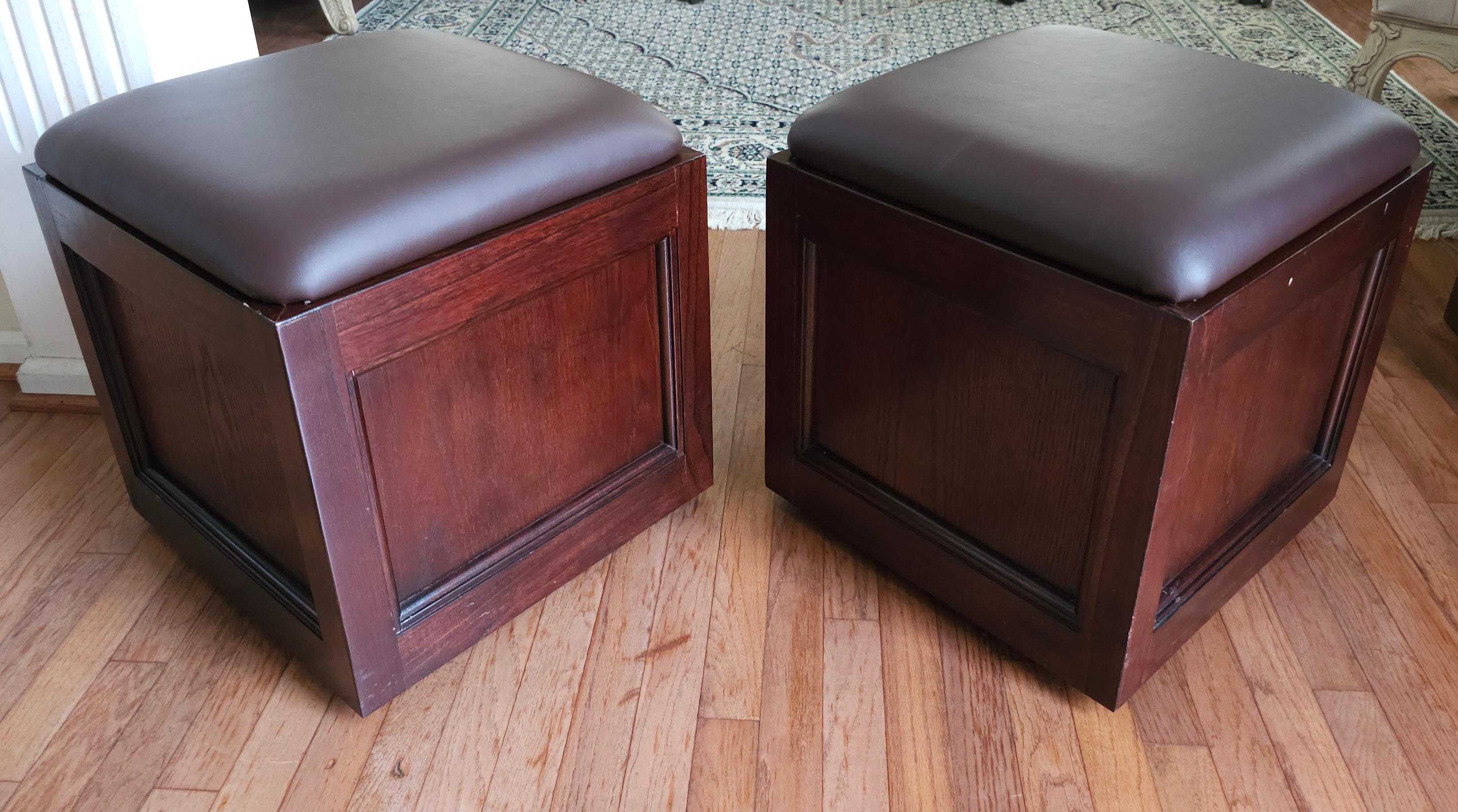 Contemporary Pair Of Hammary Furniture Fruitwood And Brown Leather Rolling Storage Ottomans For Sale