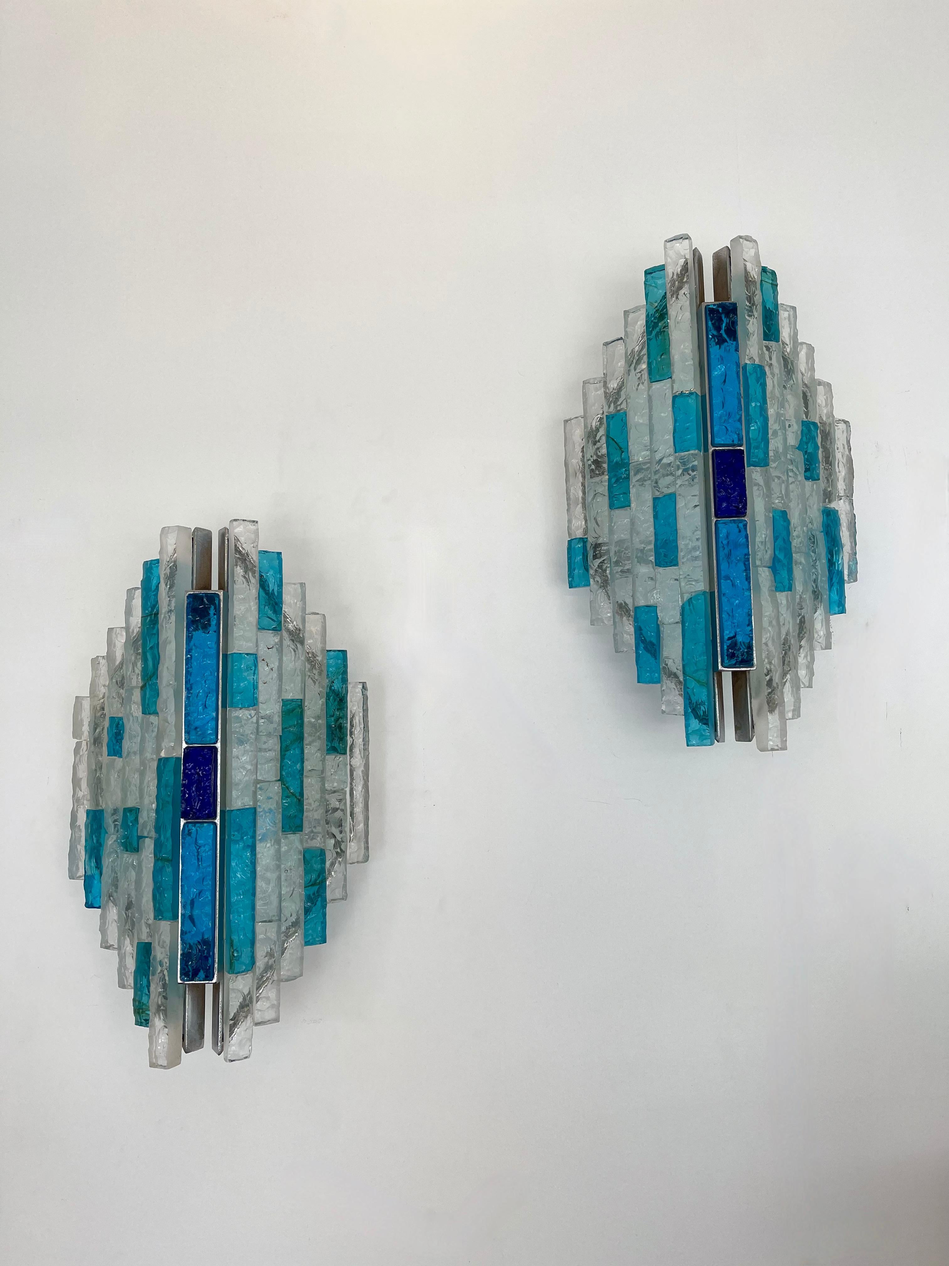 Pair of wall lamps lights sconces hammered glass and silver wrought iron by the manufacture Biancardi and Jordan Arte in Verona in a Brutalist style, the concurrent of Longobard and Poliarte during the 1970s. Famous design like Carlo Aldo Nason for