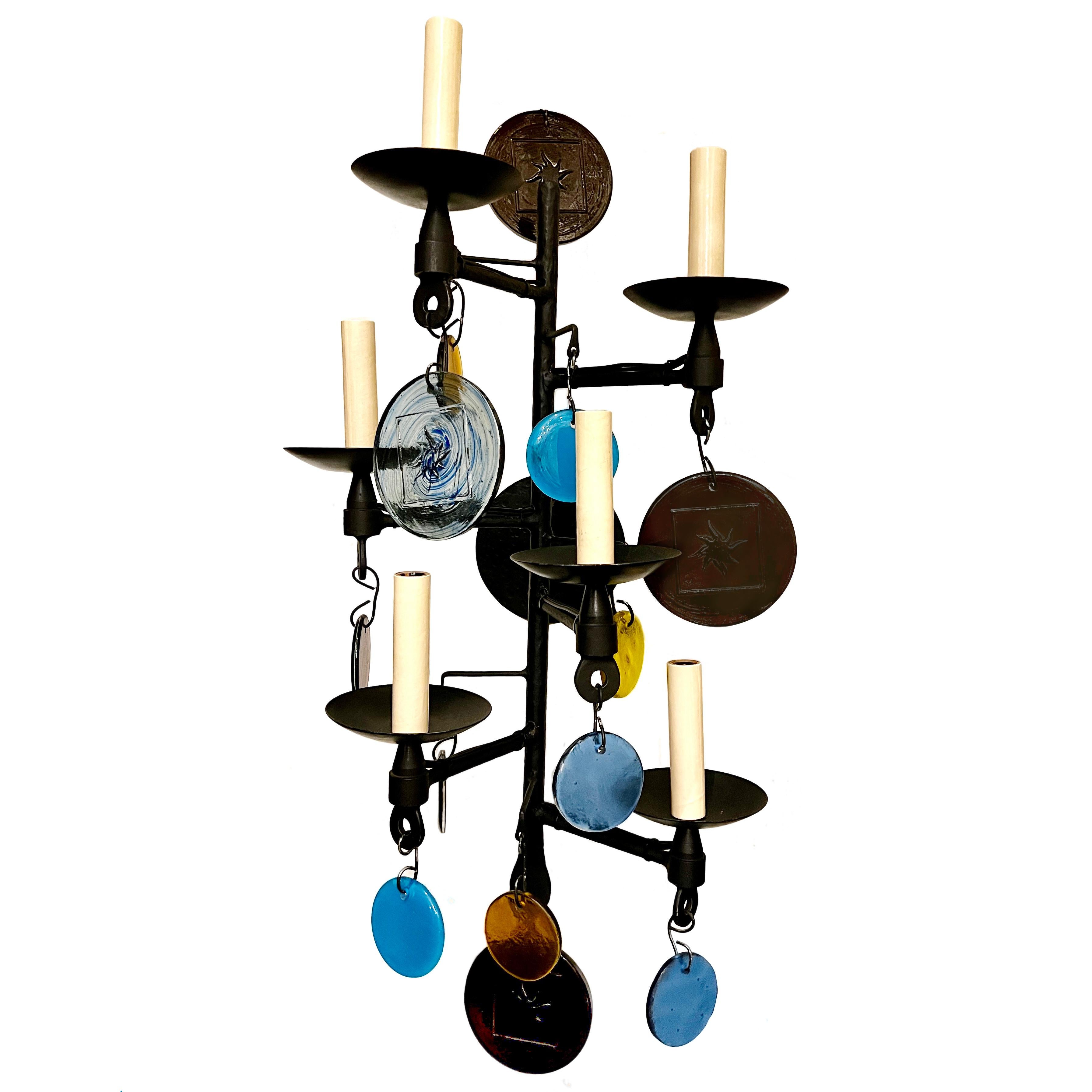 A pair of circa 1970's Swedish wrought iron sconces with molded glass and six candelabra lights each.

Measurements:
Height: 29