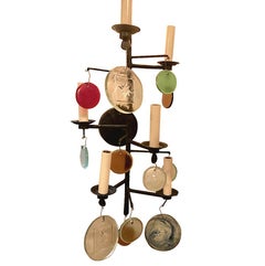 Paire d'appliques en fer martelé avec verre moulé
