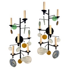Paire d'appliques en fer martelé avec verre moulé