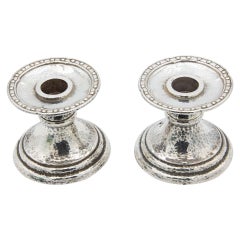 Pair of hammered silver piano candlesticks