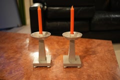 Coppia di candelabri in acciaio martellato