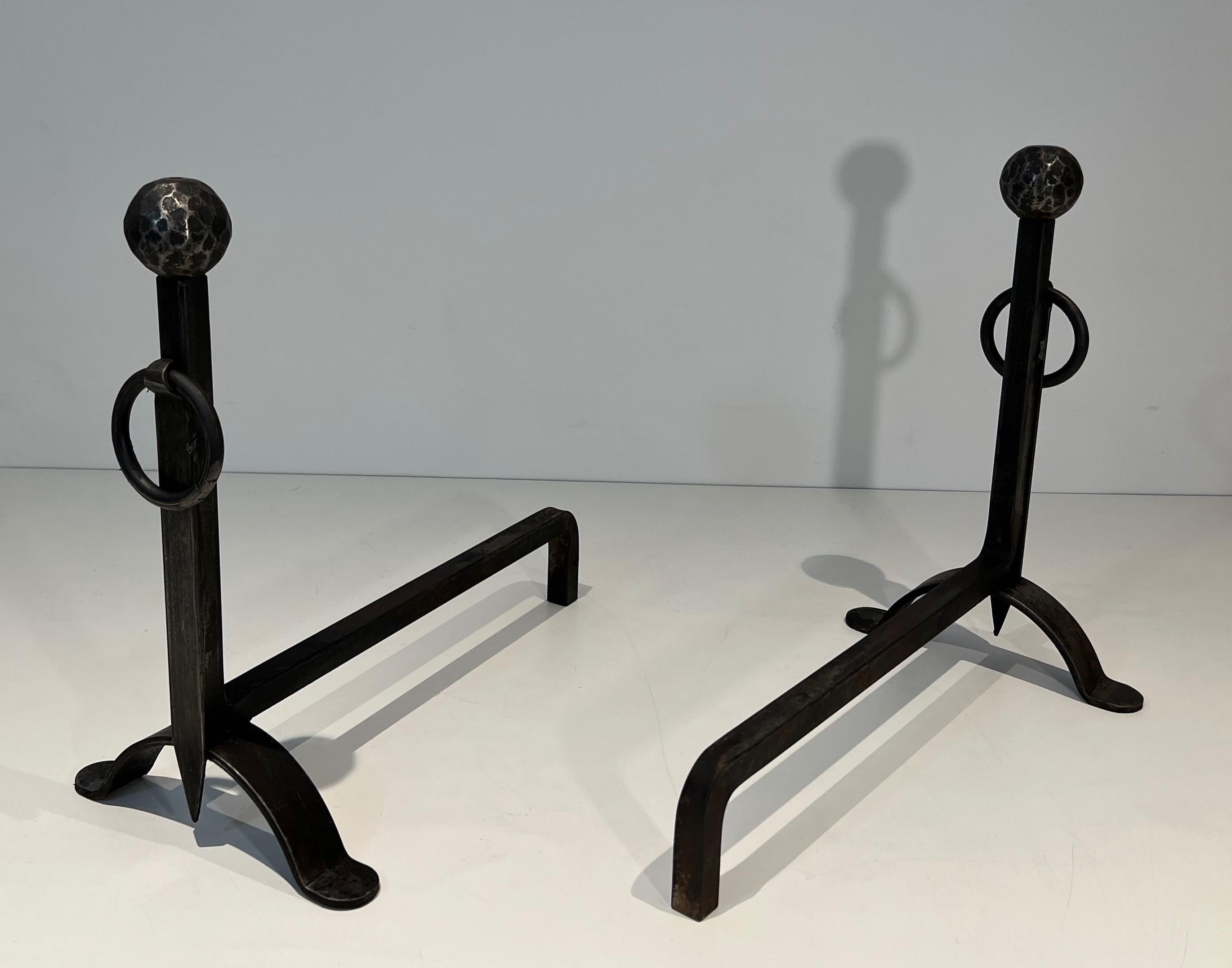 Wrought Iron Pair of hammered wrought iron andirons. French Work. Circa 1950 For Sale