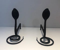 Pair of Hammered Wrought Iron Andirons with Cobras in the Style of Edgar Brandt