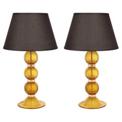 Pair of Hand Amber Hued Murano Lamps with 24-Karat Gold Bands