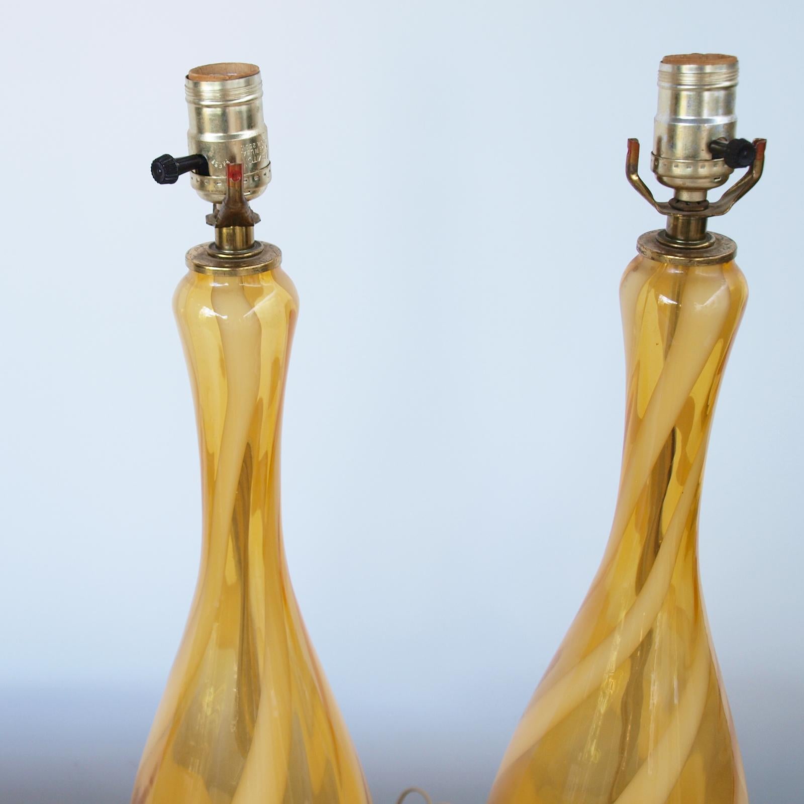 Pair of lamps, of handblown glass marked with an 