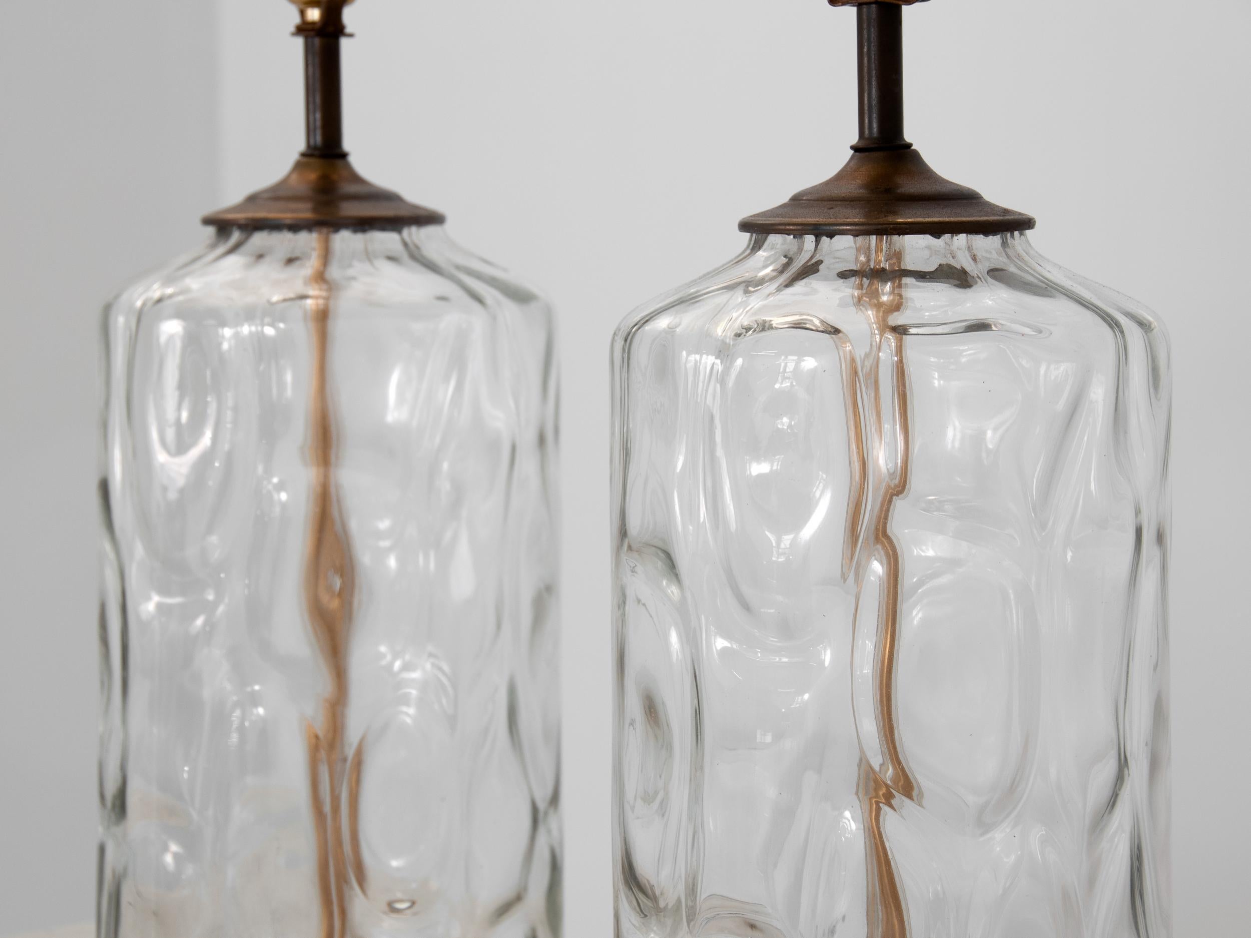 Vintage hand blown lamps with brass and wood base.