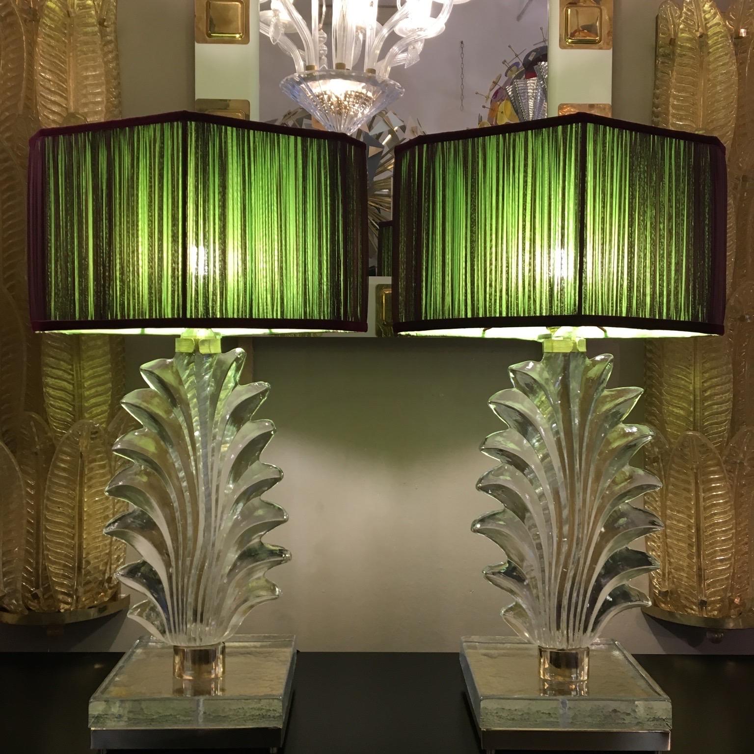 Pair of Murano hand blown clear glass leaf table lamps with square thick and heavy clear glass base. The structure is made of brass.
The lamps are presented with handmade polygonal lampshades handcrafted by our team, double color silk chiffon (acid
