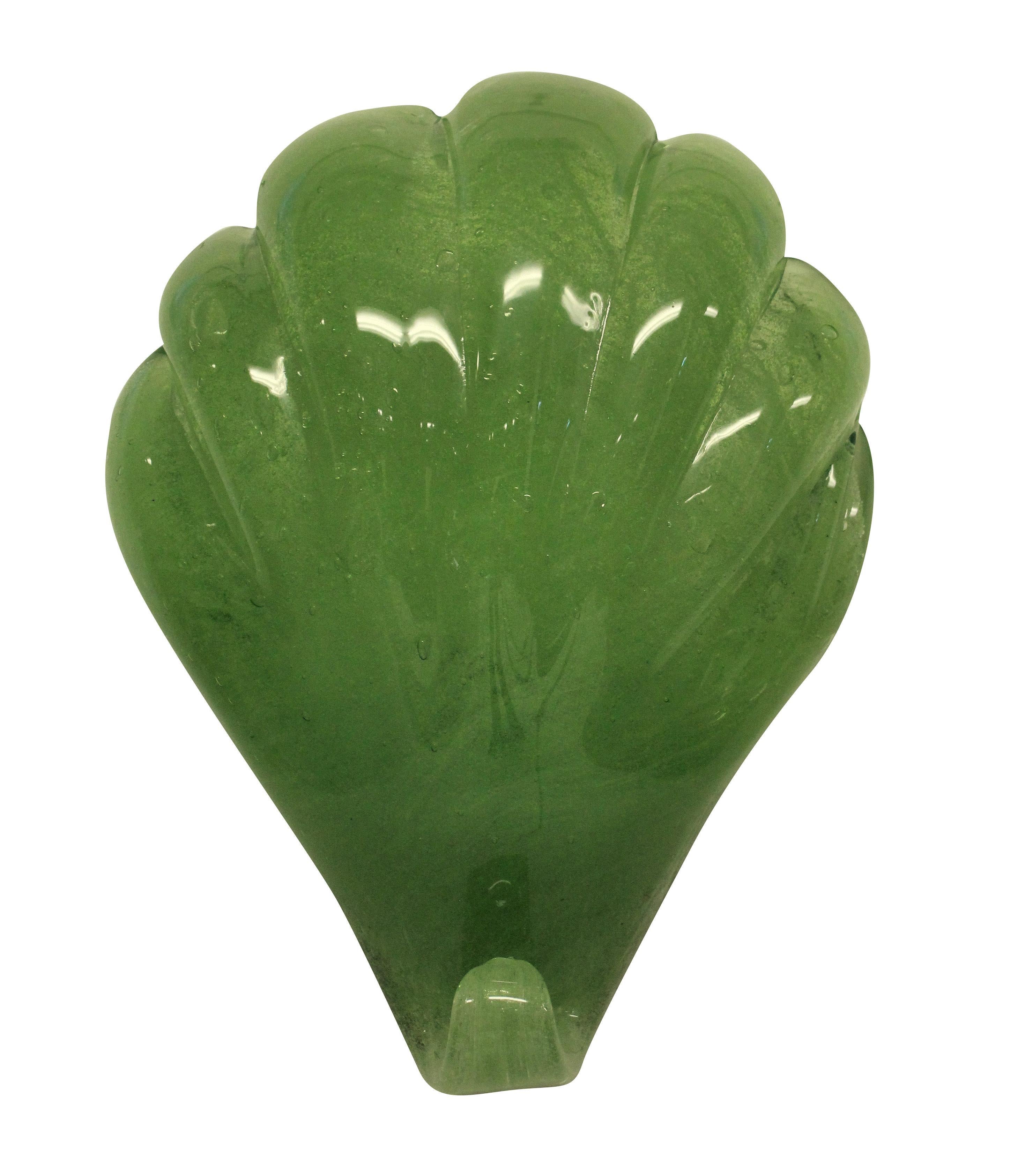 A pair of Italian wall sconces by Seguso, in beautiful chunky, hand blown apple green glass, filled with air bubbles.