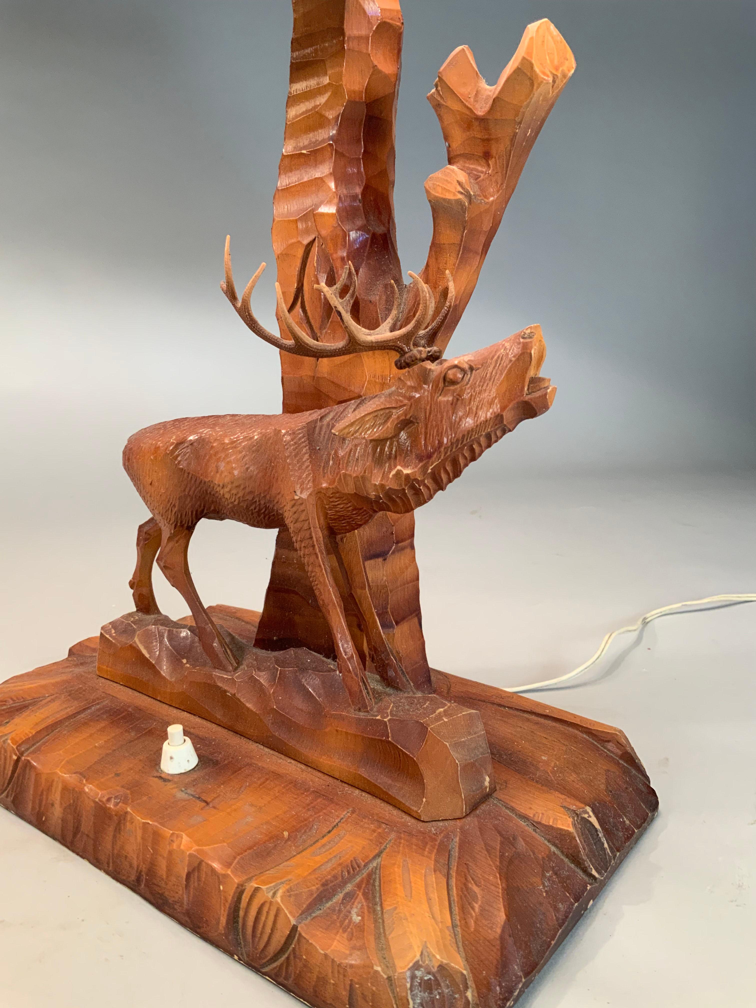 Pair of Hand Carved Adirondack Hunter & Stag Table Lamps In Good Condition In Hudson, NY