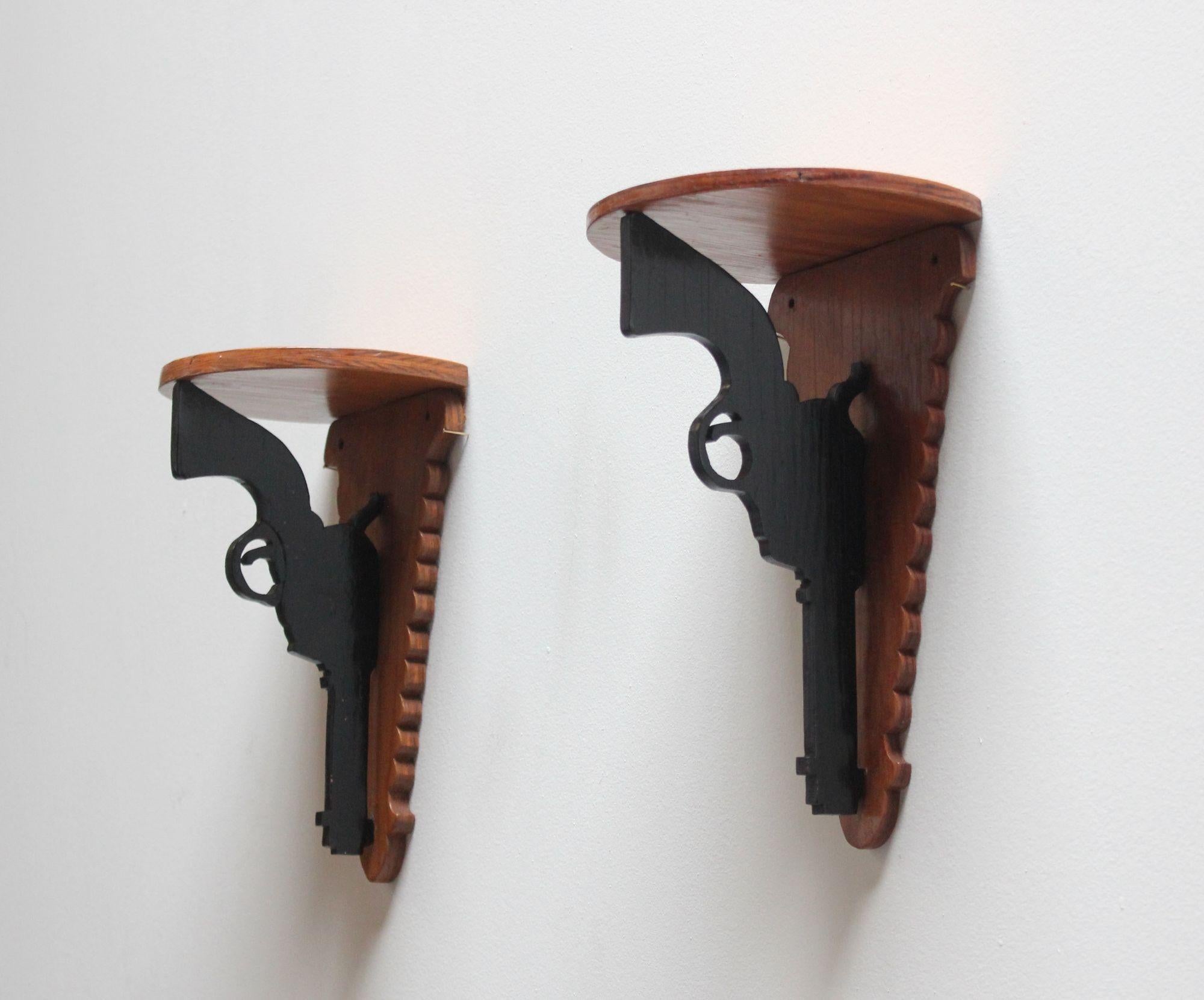 American Pair of Hand-Carved and Painted Folk Art Pistol Wall Brackets / Corner Shelves For Sale