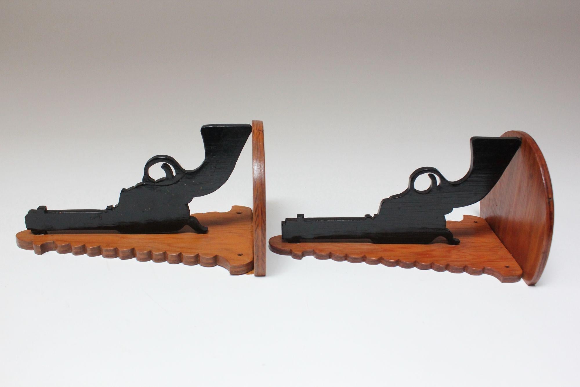 Plywood Pair of Hand-Carved and Painted Folk Art Pistol Wall Brackets / Corner Shelves For Sale