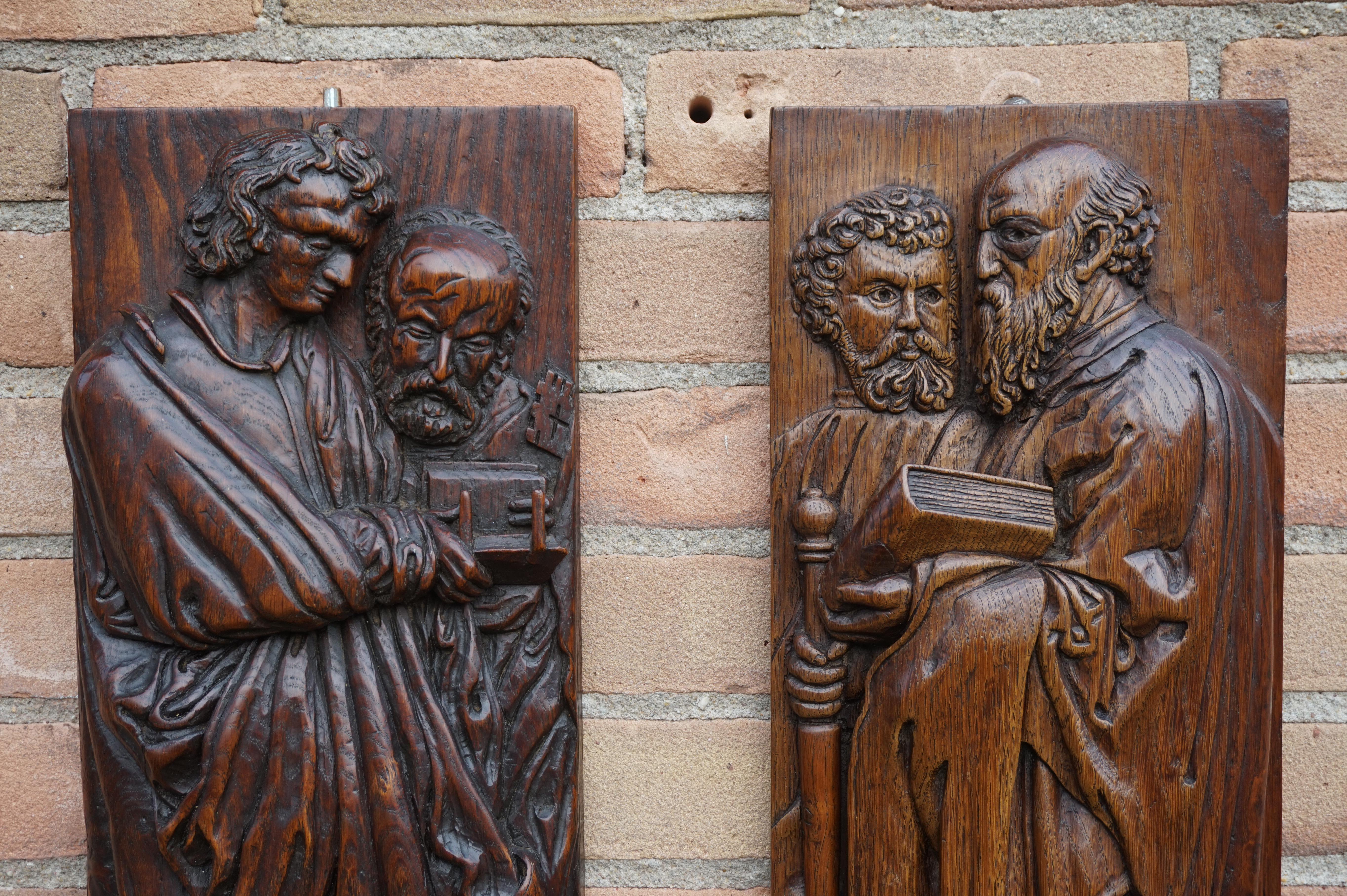 European Pair of Hand Carved Antique Wall Plaques with Apostles or Clergyman Sculptures