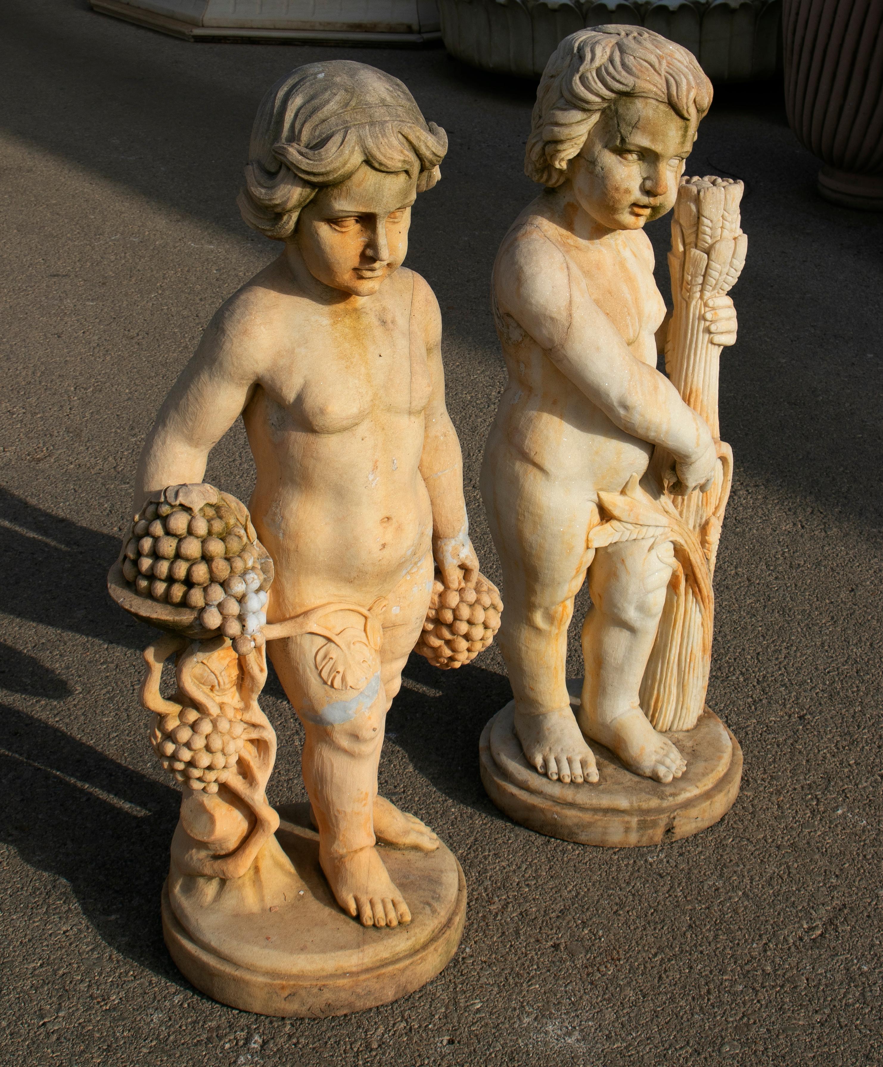 European Pair of Hand Carved Boys Marble Sculptures that Have Been Aged to Look Antique For Sale