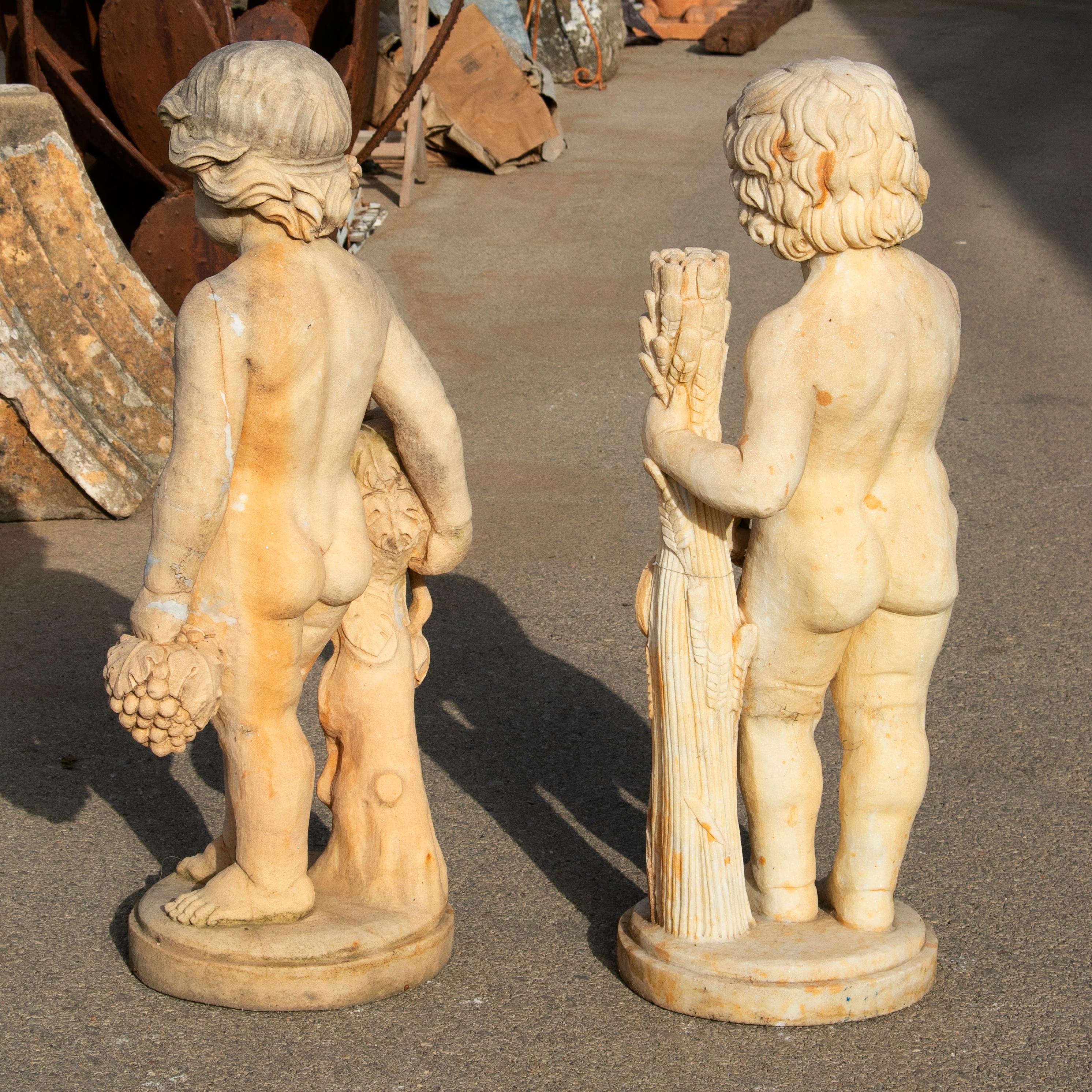 Pair of Hand Carved Boys Marble Sculptures that Have Been Aged to Look Antique In Good Condition For Sale In Marbella, ES