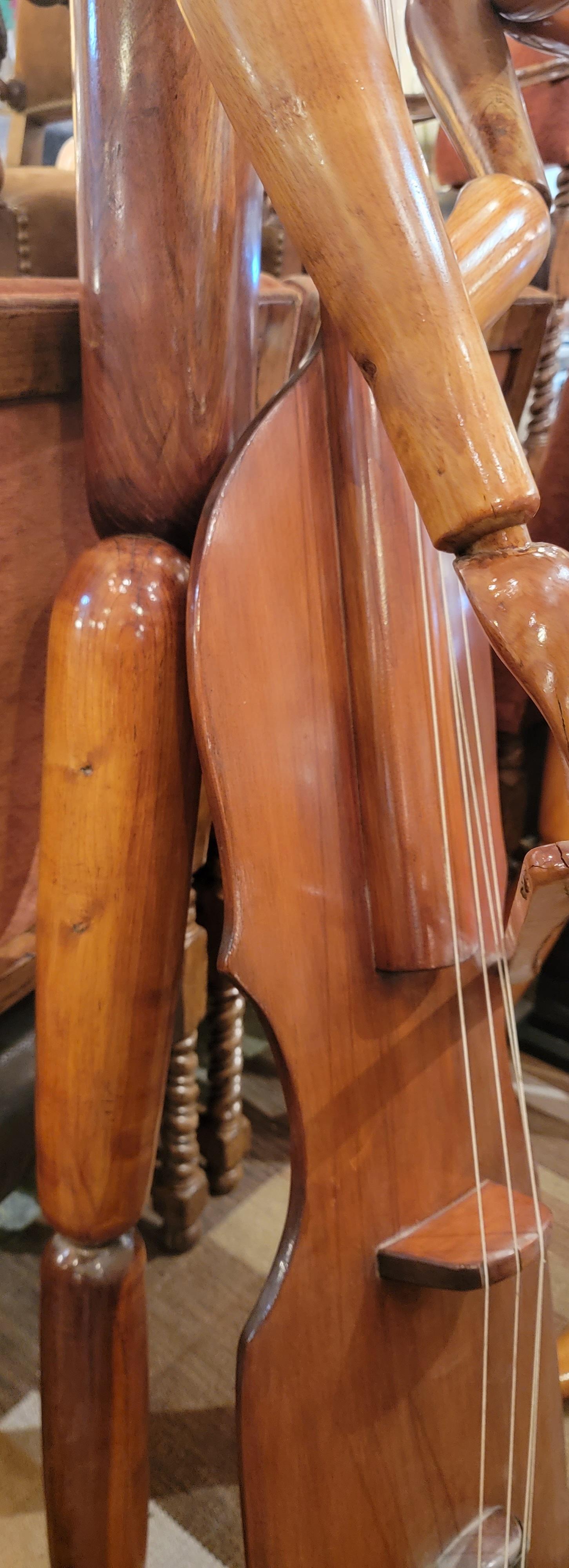 Mid-Century Modern Pair of hand Carved Brazillian  Life Sized Wooden Musician Sculptures