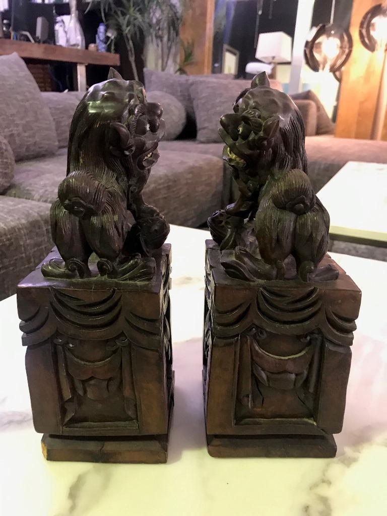 Pair of Hand Carved Chinese Wood Carved, Bone Inlay Foo Dogs, circa Early 1900s In Good Condition For Sale In Studio City, CA