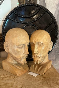 Antique pair of hand-carved distinguished gentlemen bust sculptures