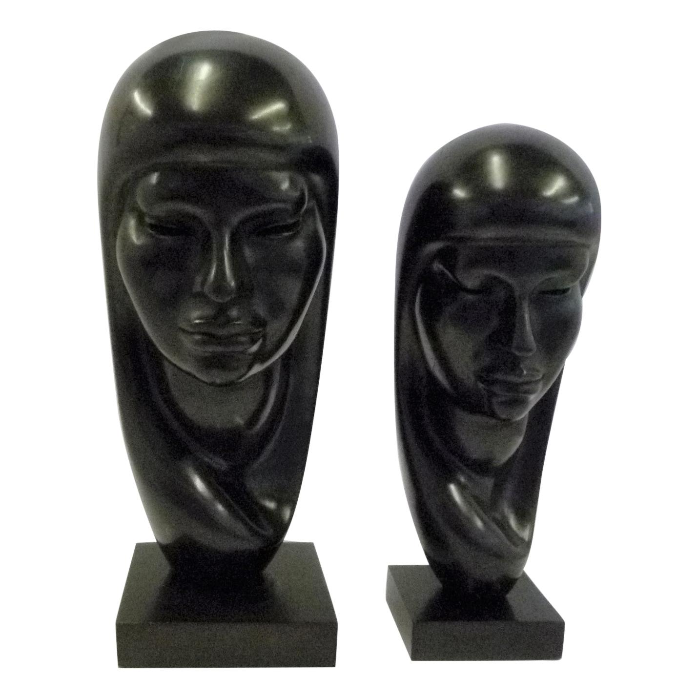 Pair of Hand Carved Ebonized Wood Sculptures of Native Women Signed Arias, 1950s