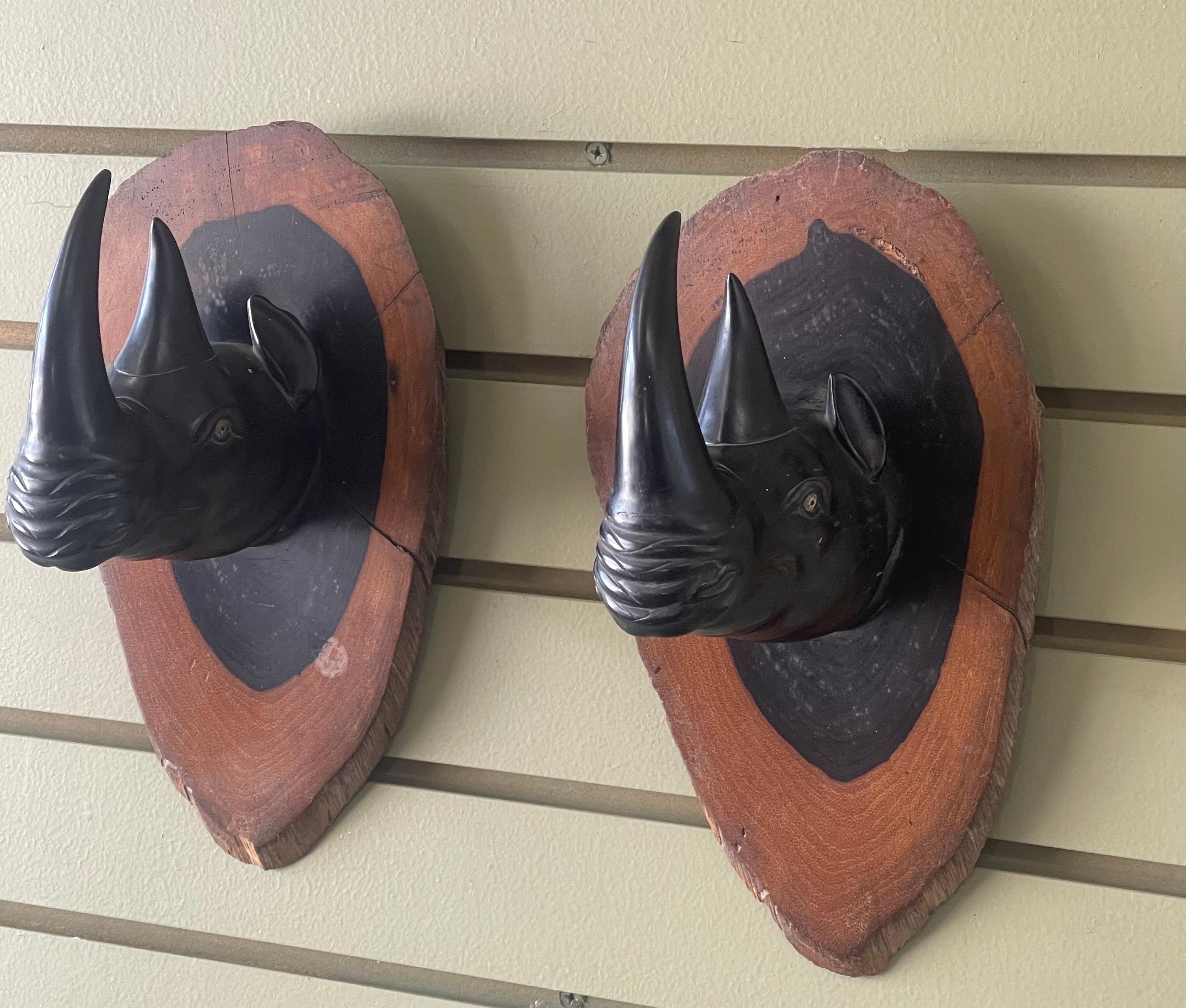 Pair of Hand Carved Ebony Rhino / Rhinoceros Wall Plaques / Sculptures In Good Condition For Sale In San Diego, CA