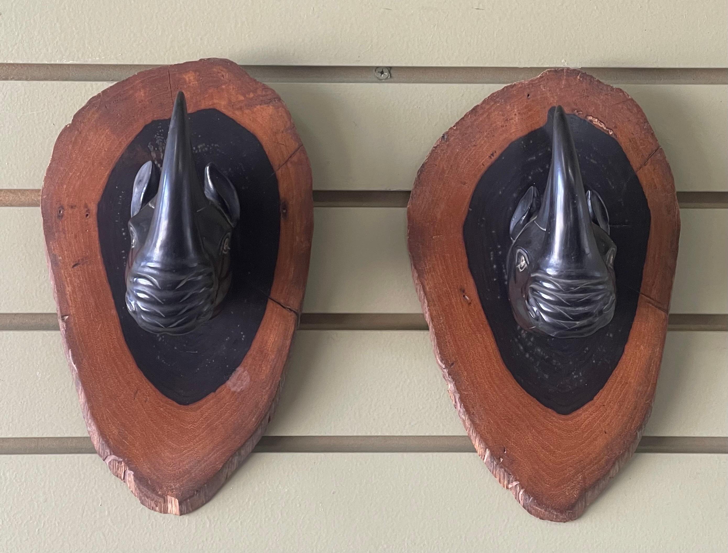 20th Century Pair of Hand Carved Ebony Rhino / Rhinoceros Wall Plaques / Sculptures For Sale