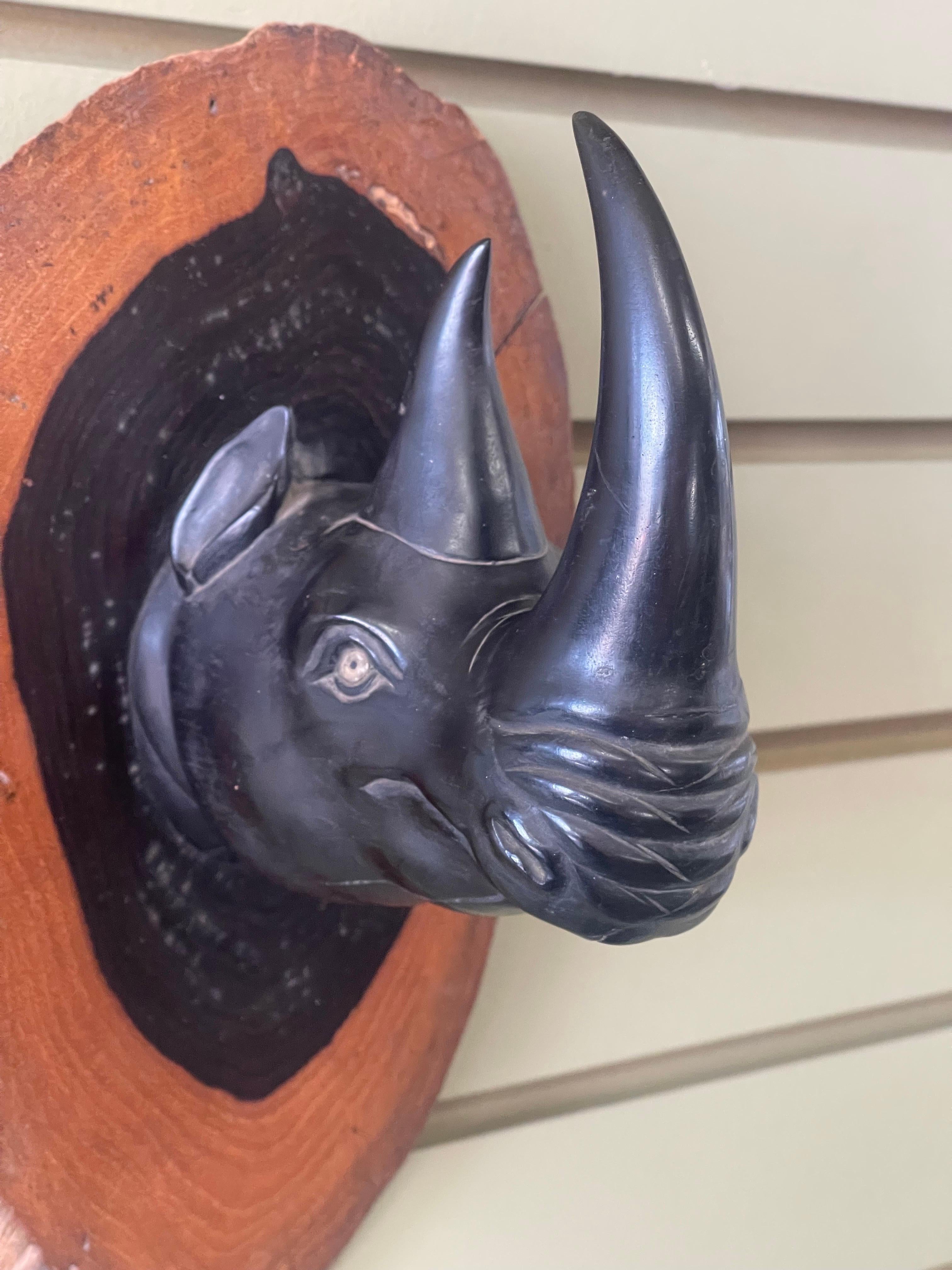 Hardwood Pair of Hand Carved Ebony Rhino / Rhinoceros Wall Plaques / Sculptures For Sale