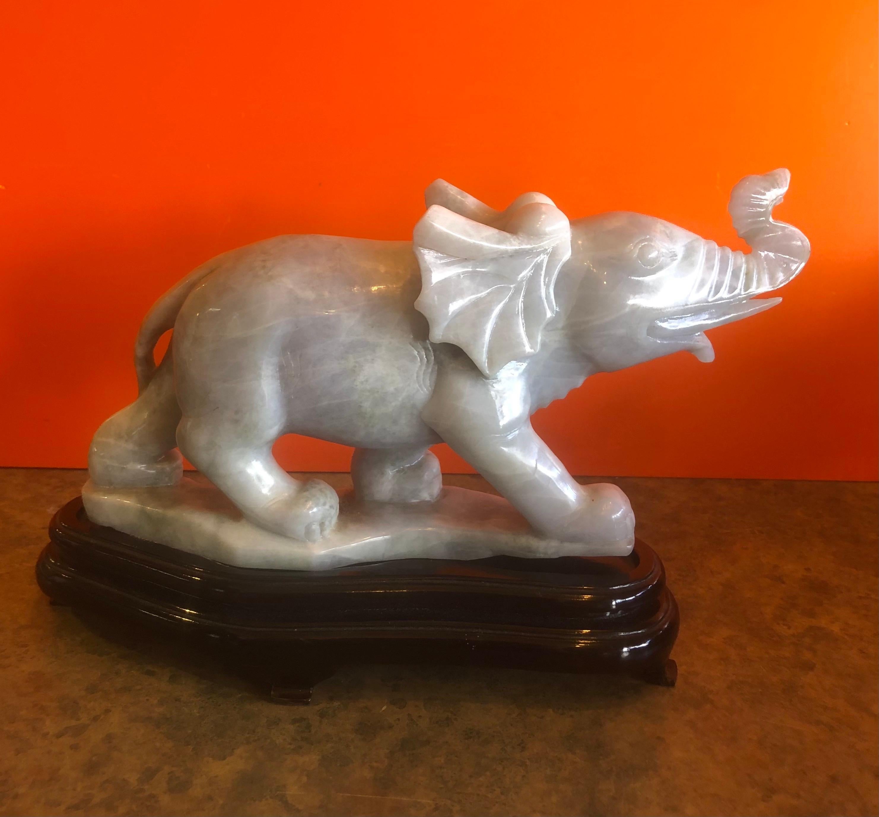 Chinese Pair of Hand Carved Elephant Sculptures on Bases in White Jade For Sale