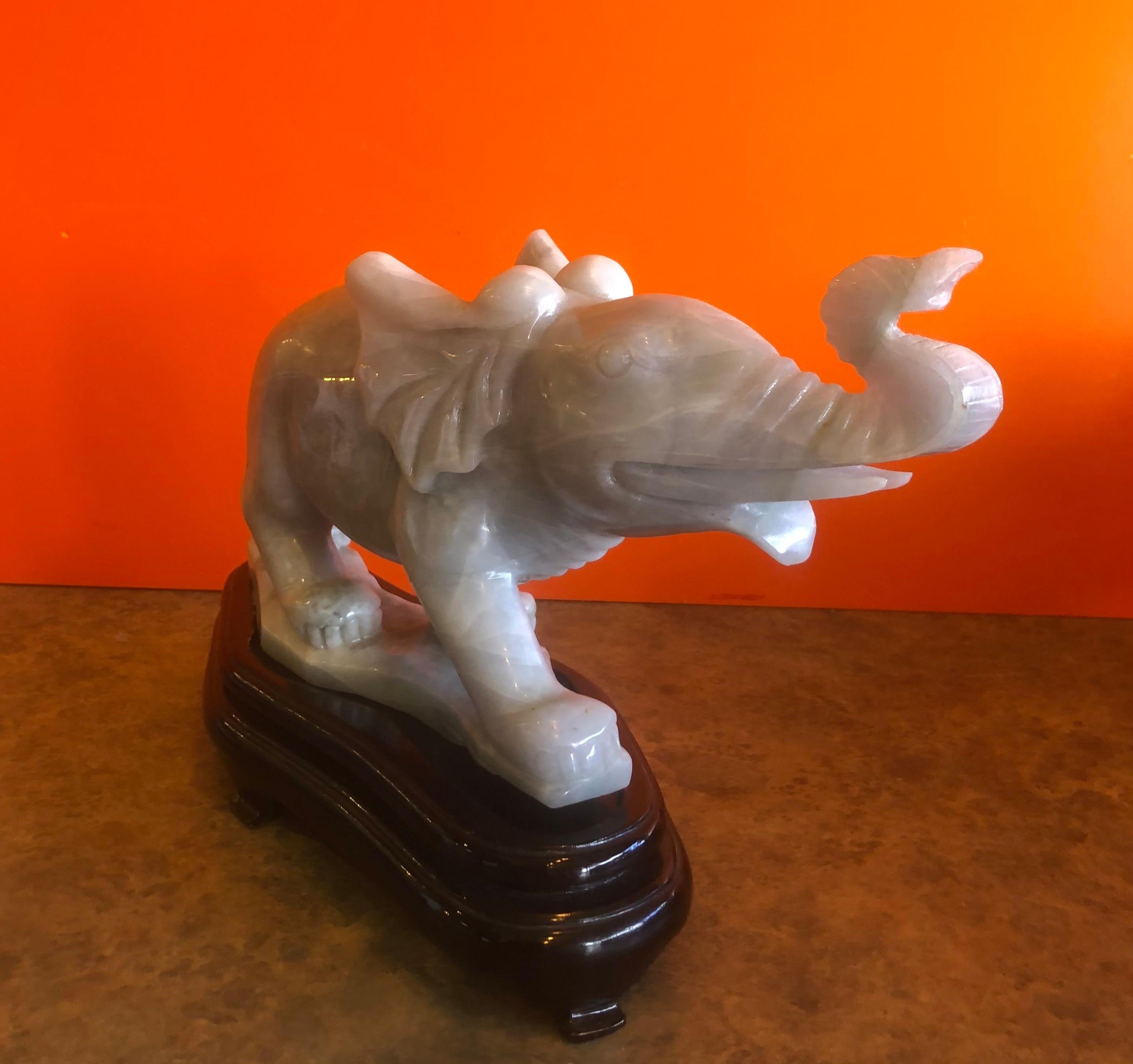 Hand-Carved Pair of Hand Carved Elephant Sculptures on Bases in White Jade For Sale