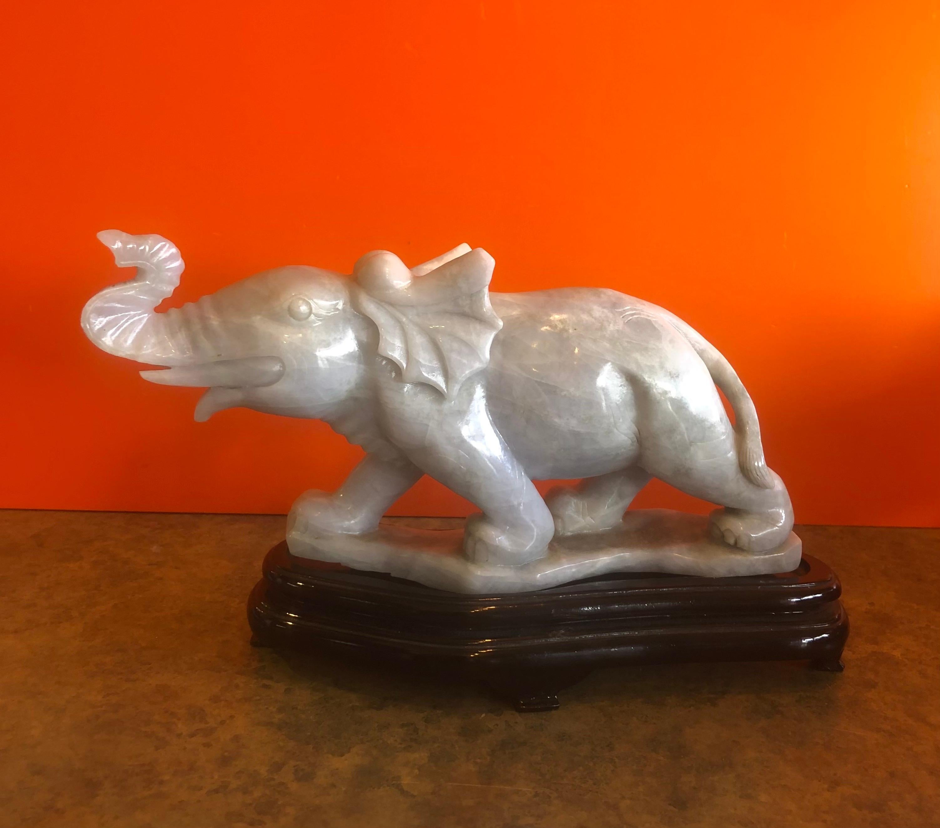 20th Century Pair of Hand Carved Elephant Sculptures on Bases in White Jade For Sale