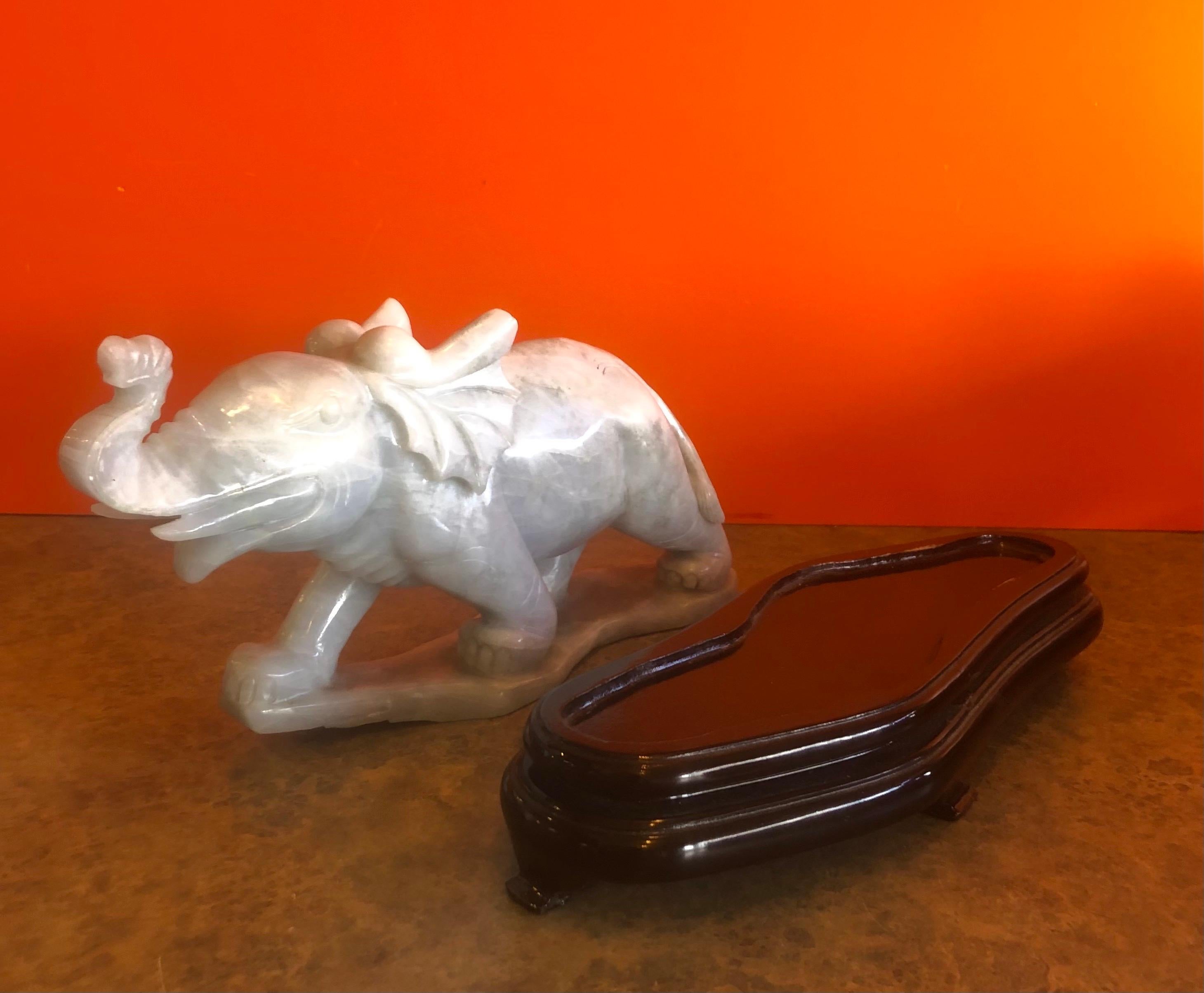 Pair of Hand Carved Elephant Sculptures on Bases in White Jade For Sale 1