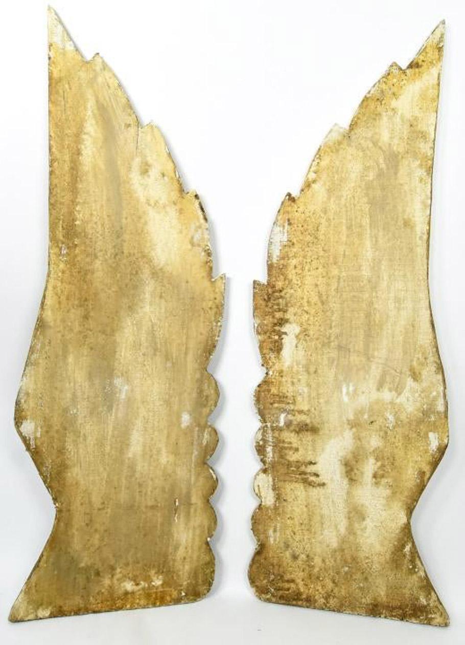 Large and very impressive pair of hand carved gilt and gesso angel wings. Architectural salvage with Classical Roman influence. Perfect as wall decoration. Sculpture en relief to decorate hanging over a doorway, above a bed, on large console or